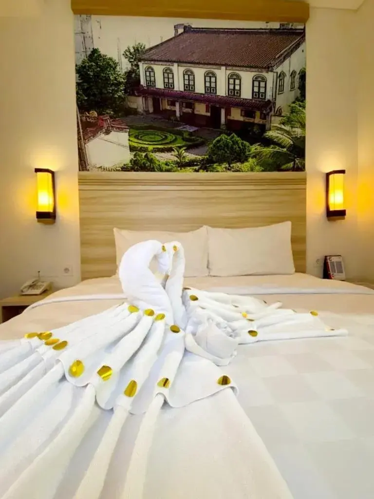 Bed in Cordela Inn Millennium Medan Bed in Cordela Inn Millennium Medan