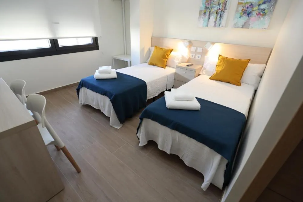 Photo of the whole room, Bed in H.PALMONES