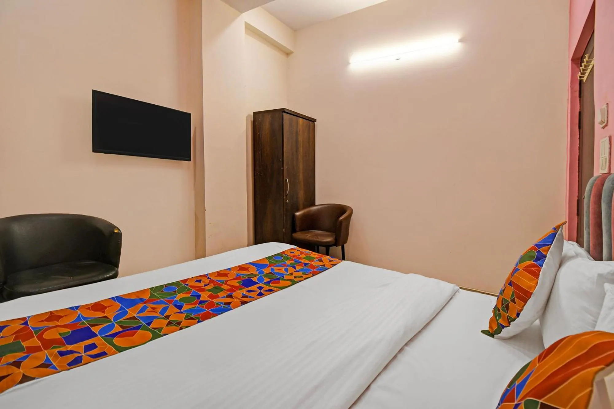 Bed in FabHotel Insight Inn