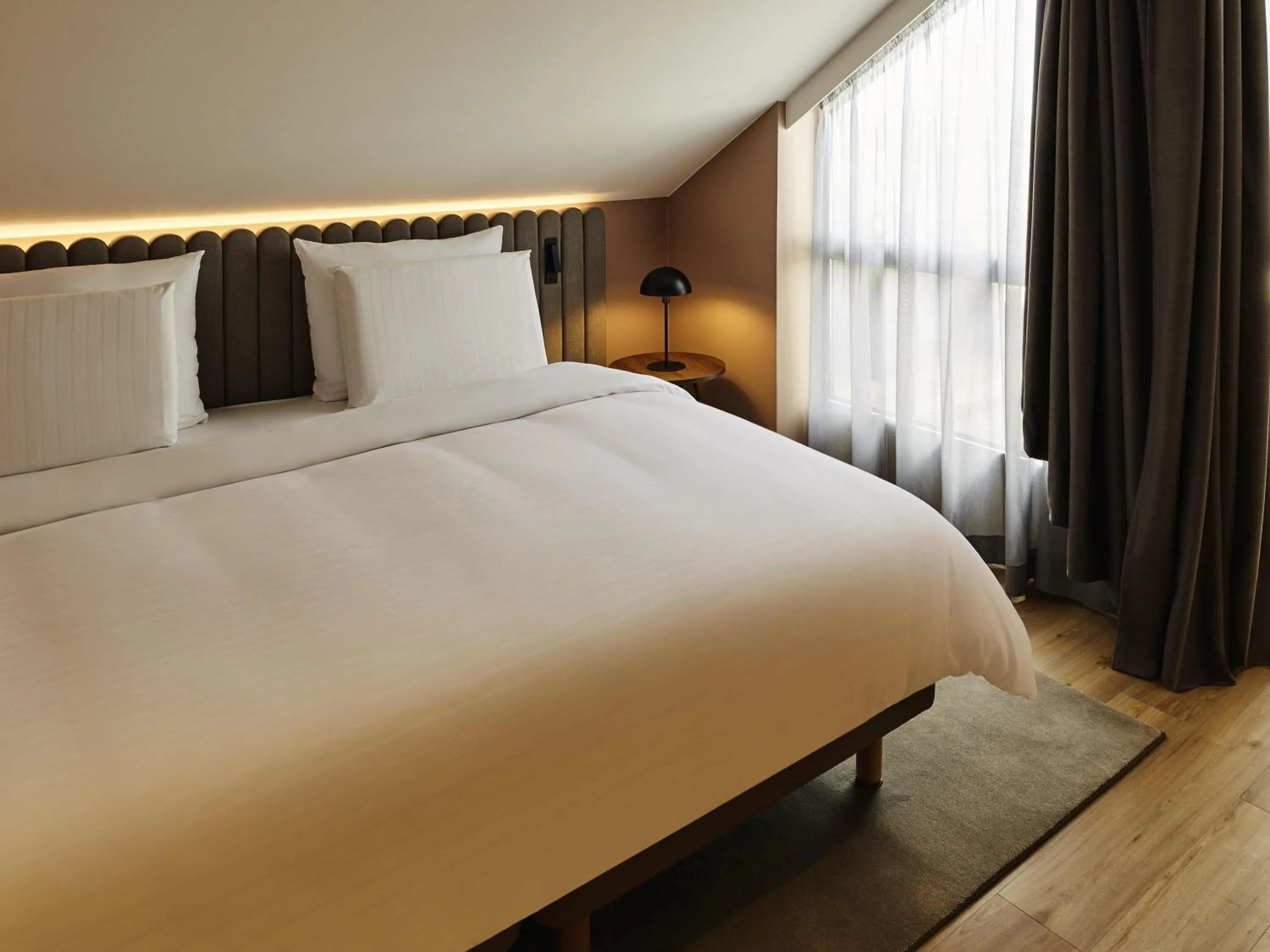 Photo of the whole room, Bed in Pullman Stuttgart Fontana