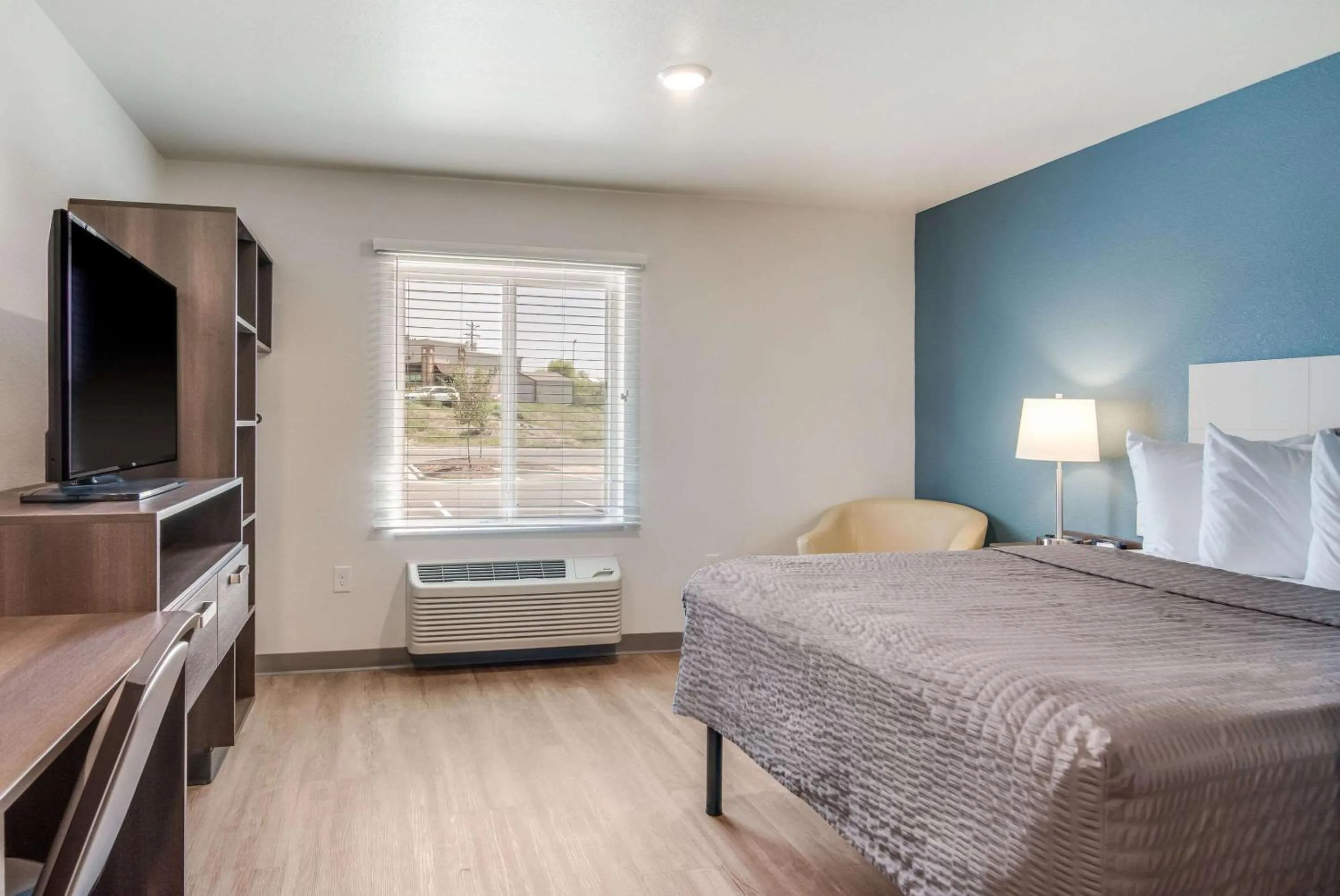 Photo of the whole room, Bed in WoodSpring Suites Fort Mill