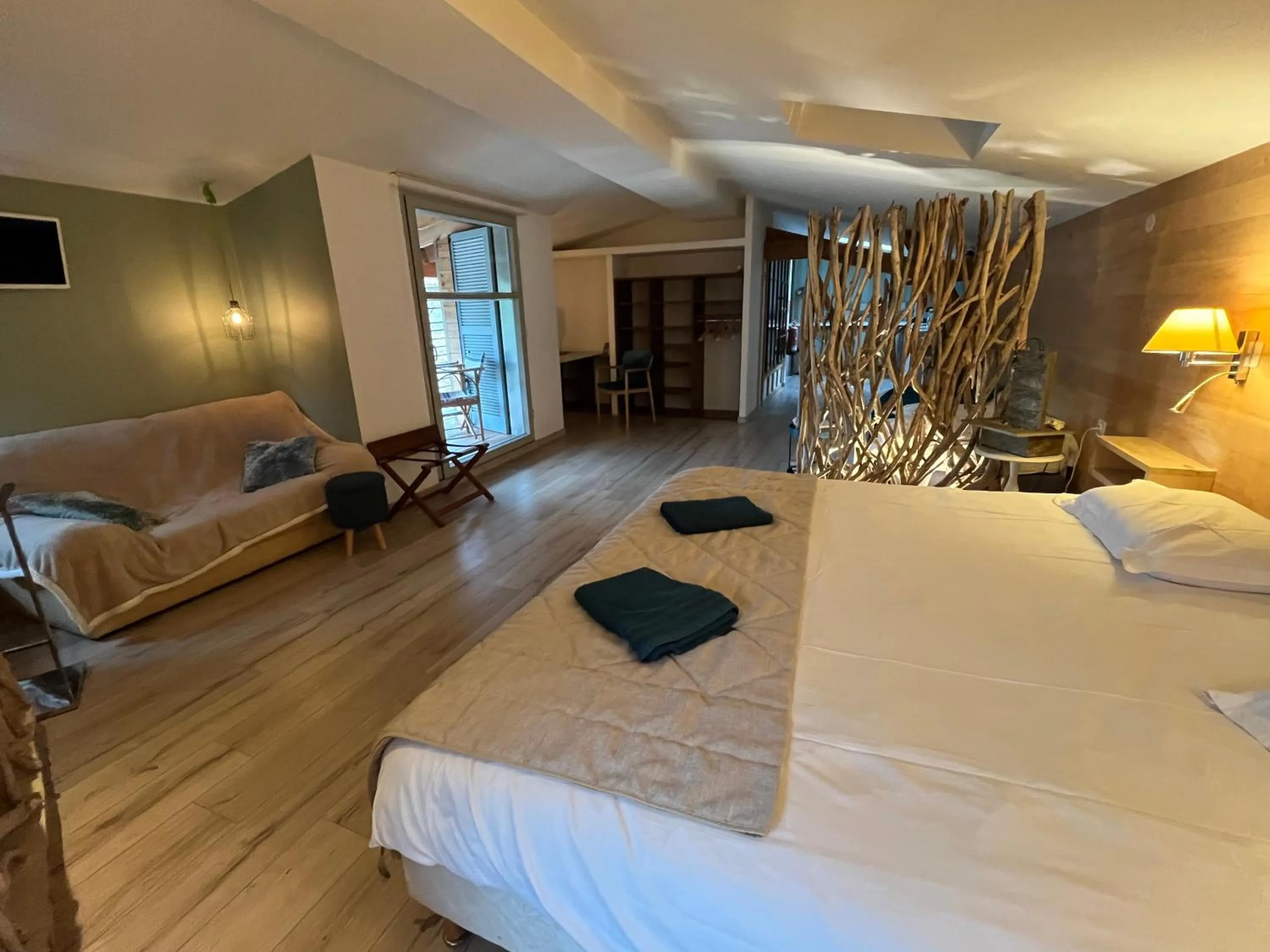 Bed in Logis Hotel Nature Cathare