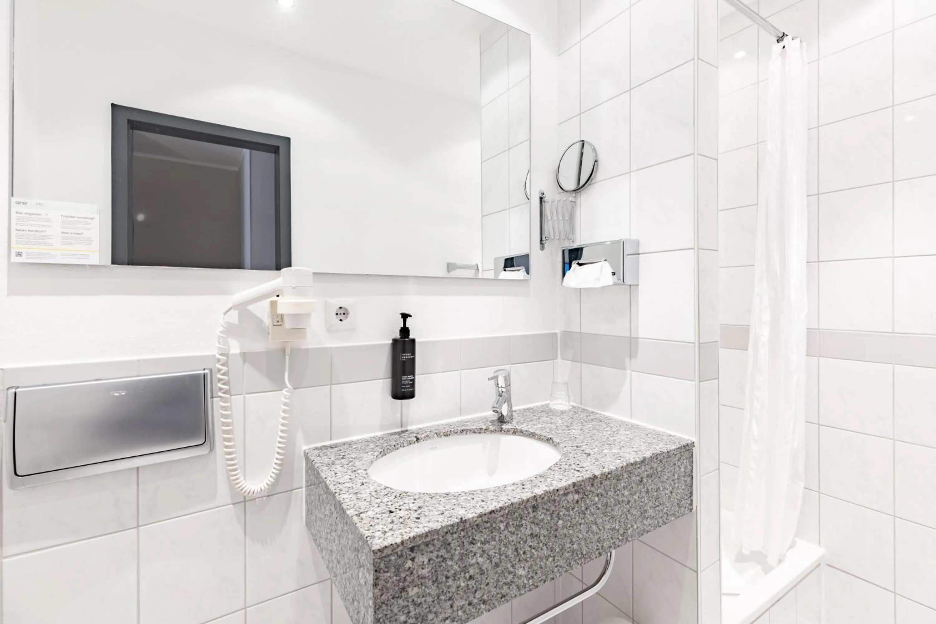 Bathroom in Garner Hotel Cologne Porz - Airport by IHG