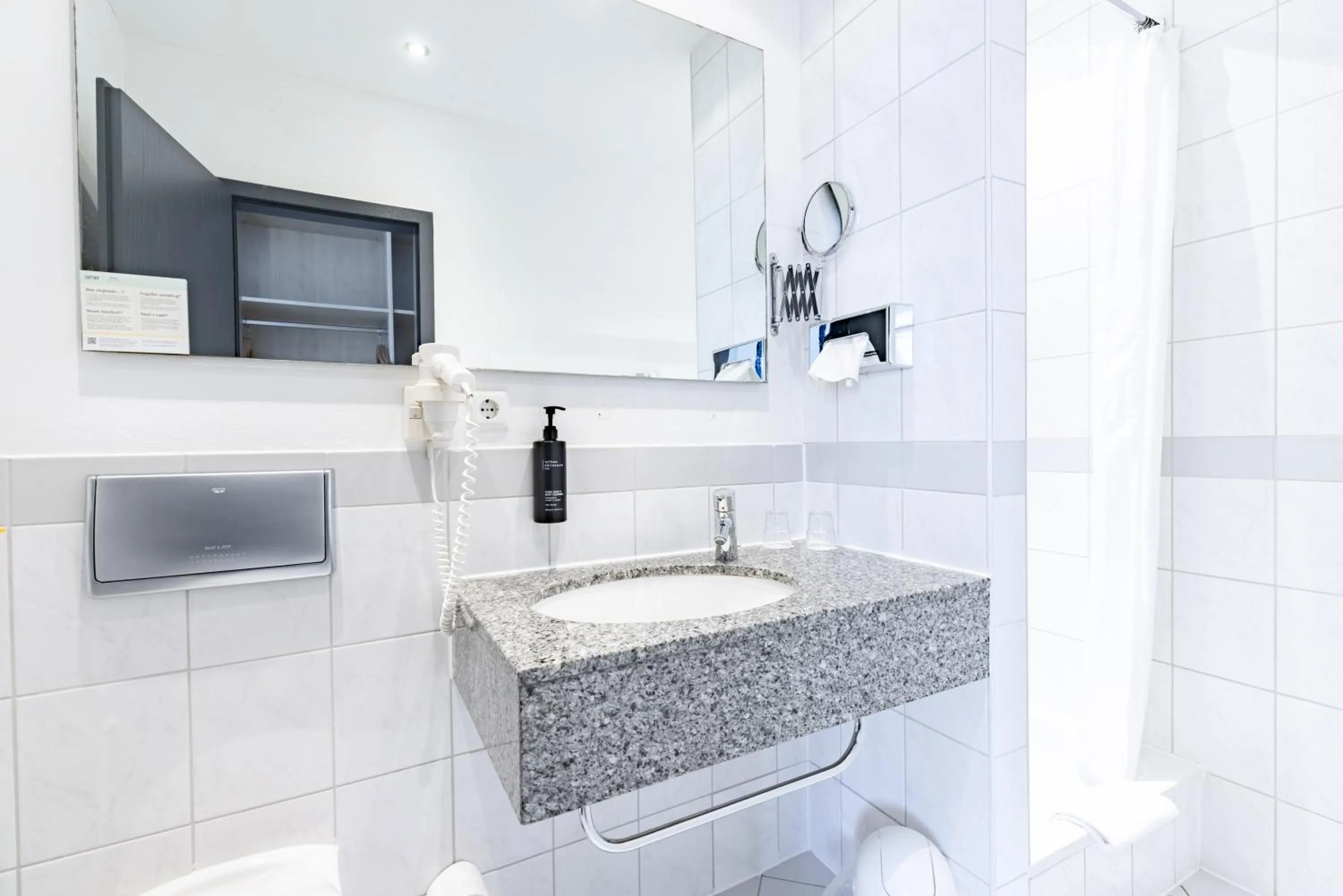 Bathroom in Garner Hotel Cologne Porz - Airport by IHG