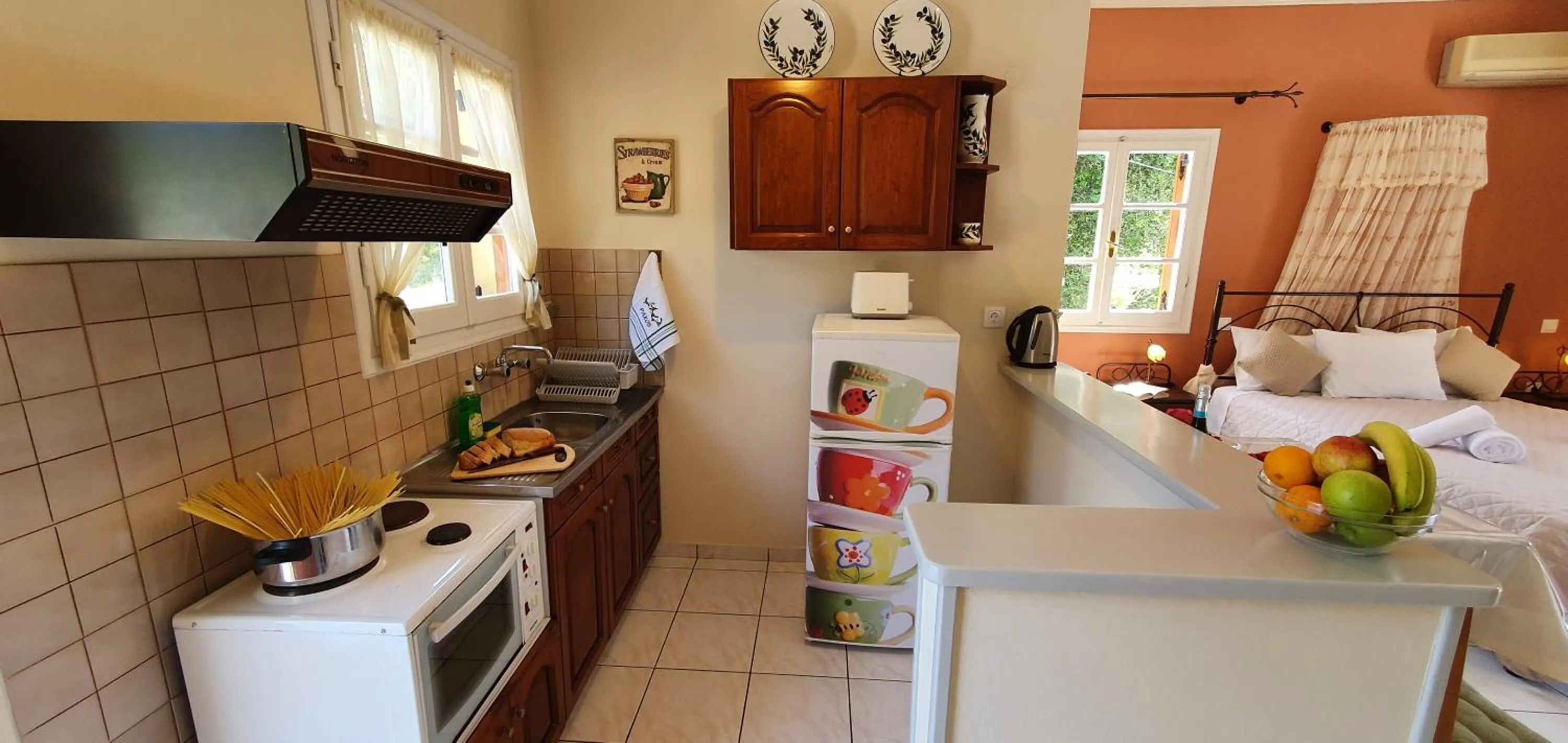 kitchen in LIvadi Studios with Pool