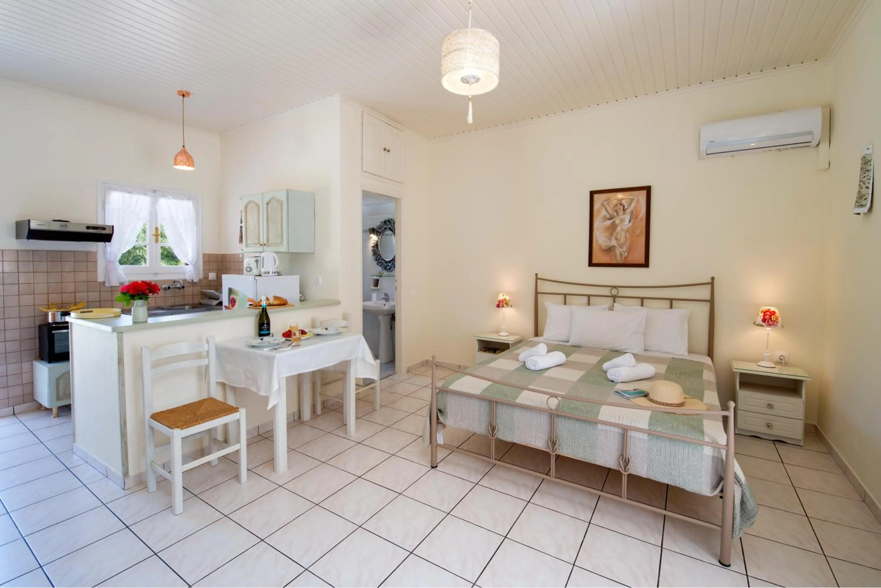 Bed in LIvadi Studios with Pool