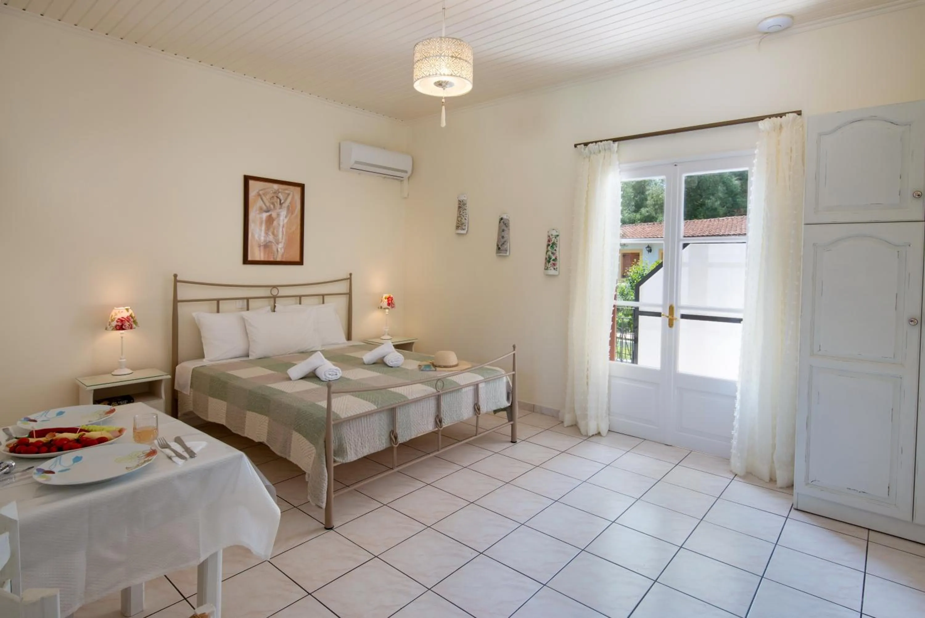 Bed in LIvadi Studios with Pool