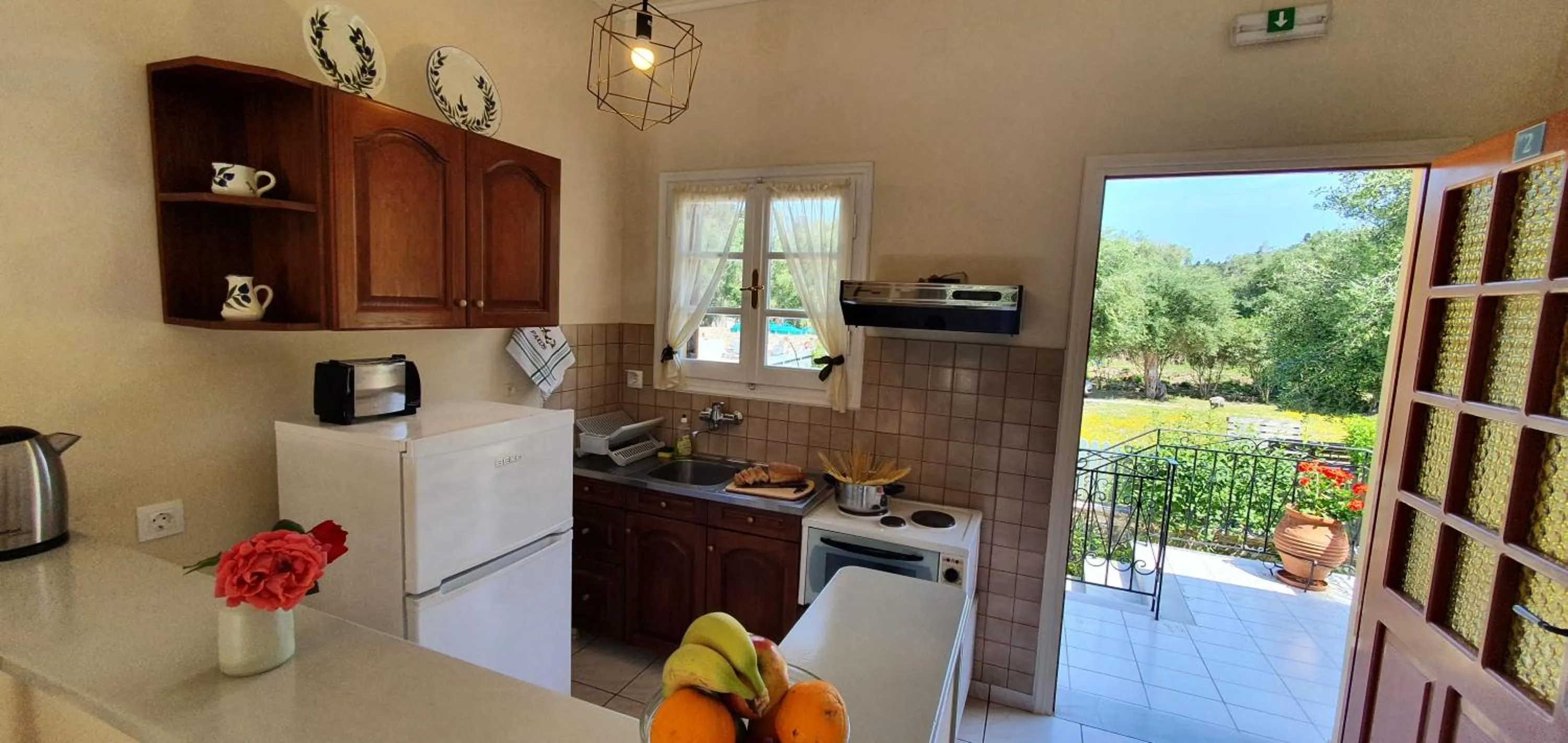 Garden view in LIvadi Studios with Pool