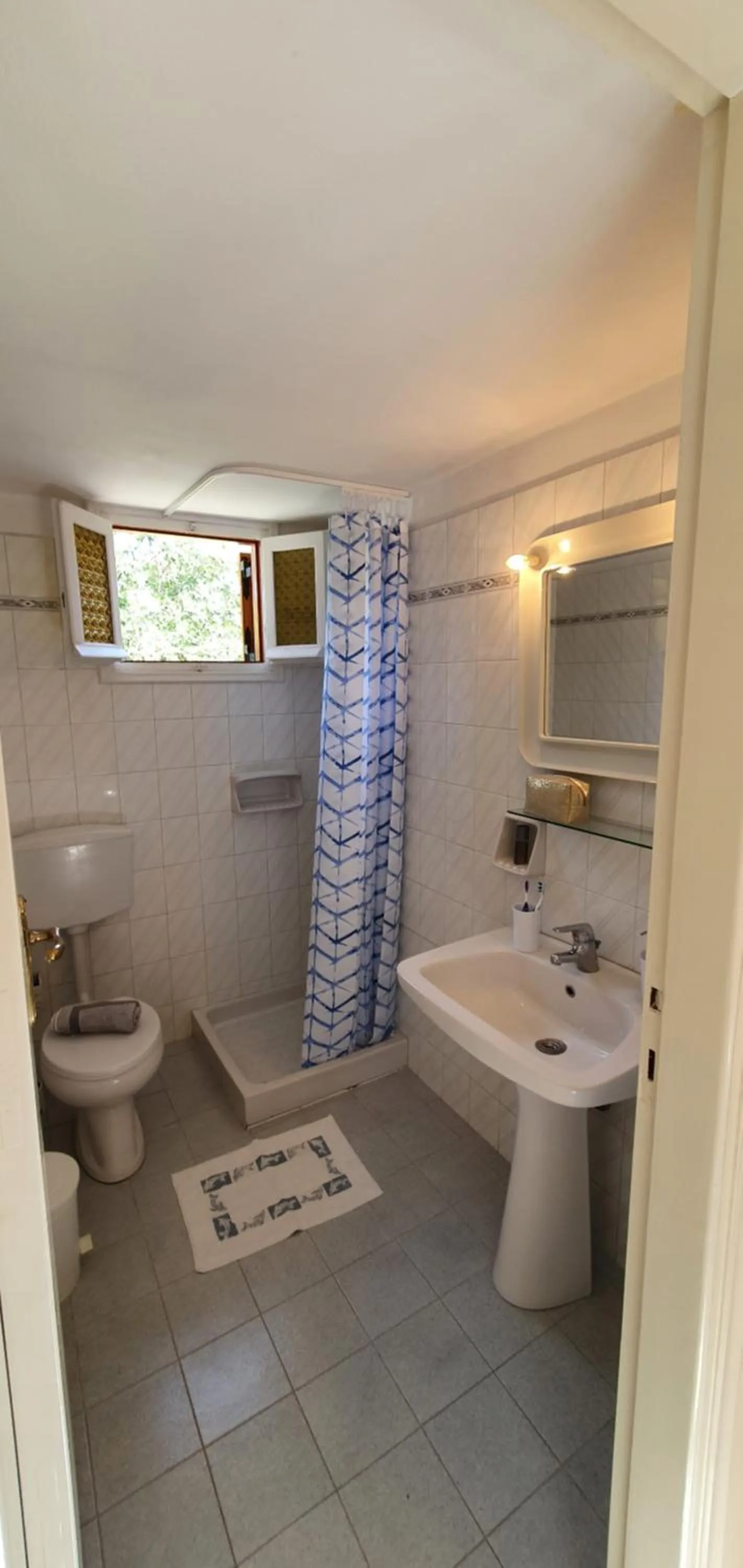 Bathroom in LIvadi Studios with Pool