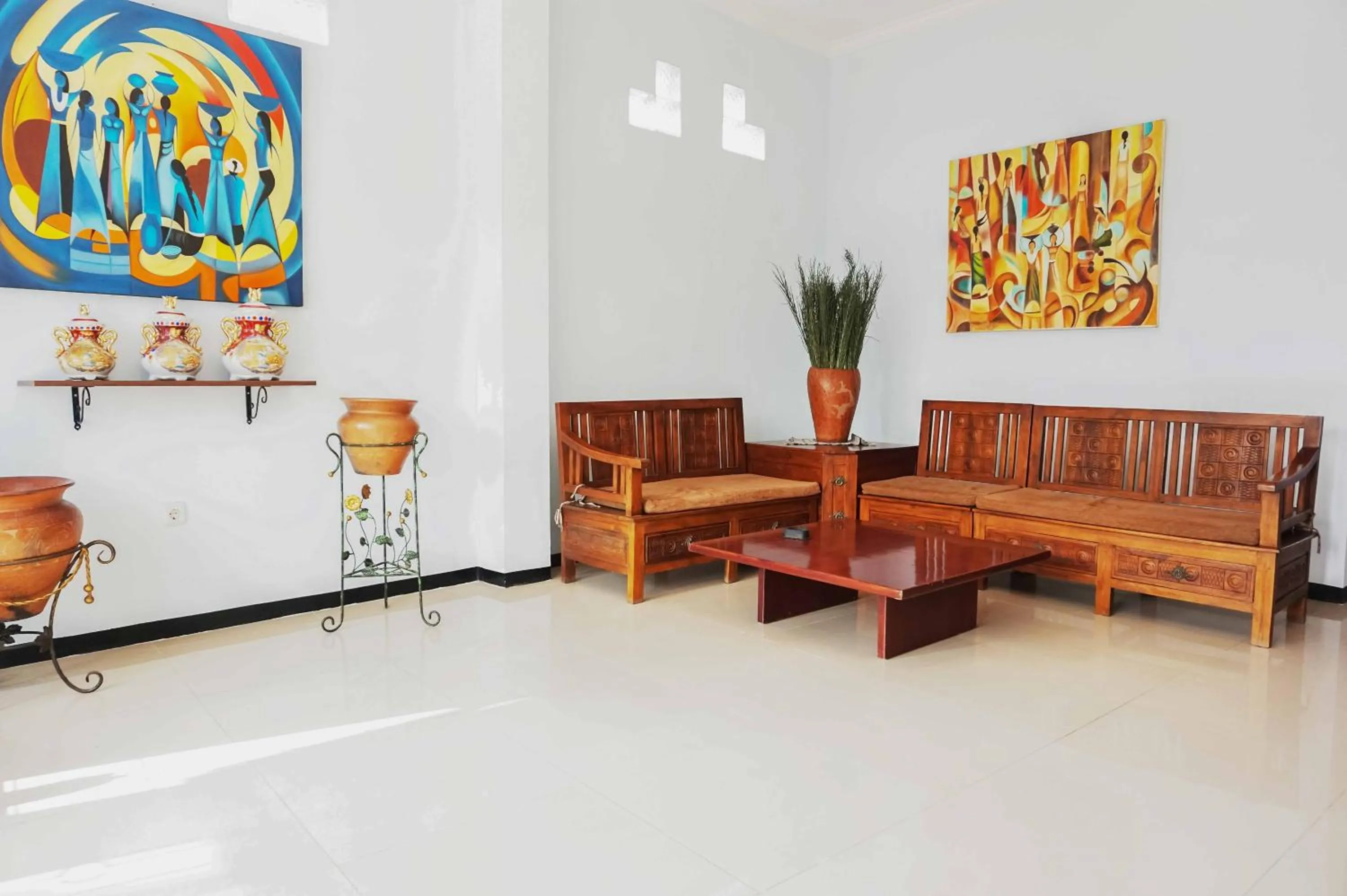 Property logo or sign in RedDoorz near Velodrome Malang 2