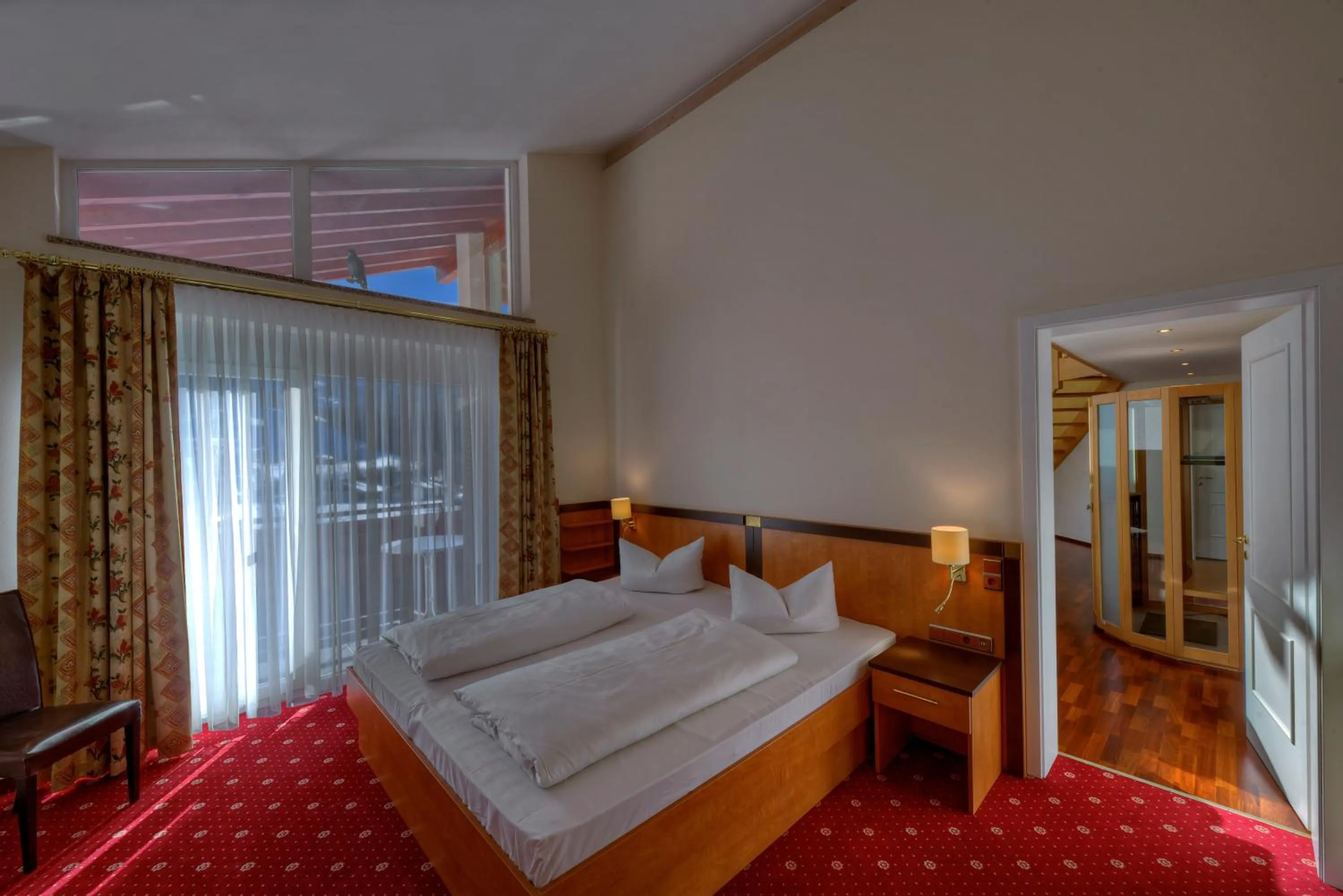Photo of the whole room, Bed in Königshof Hotel Resort