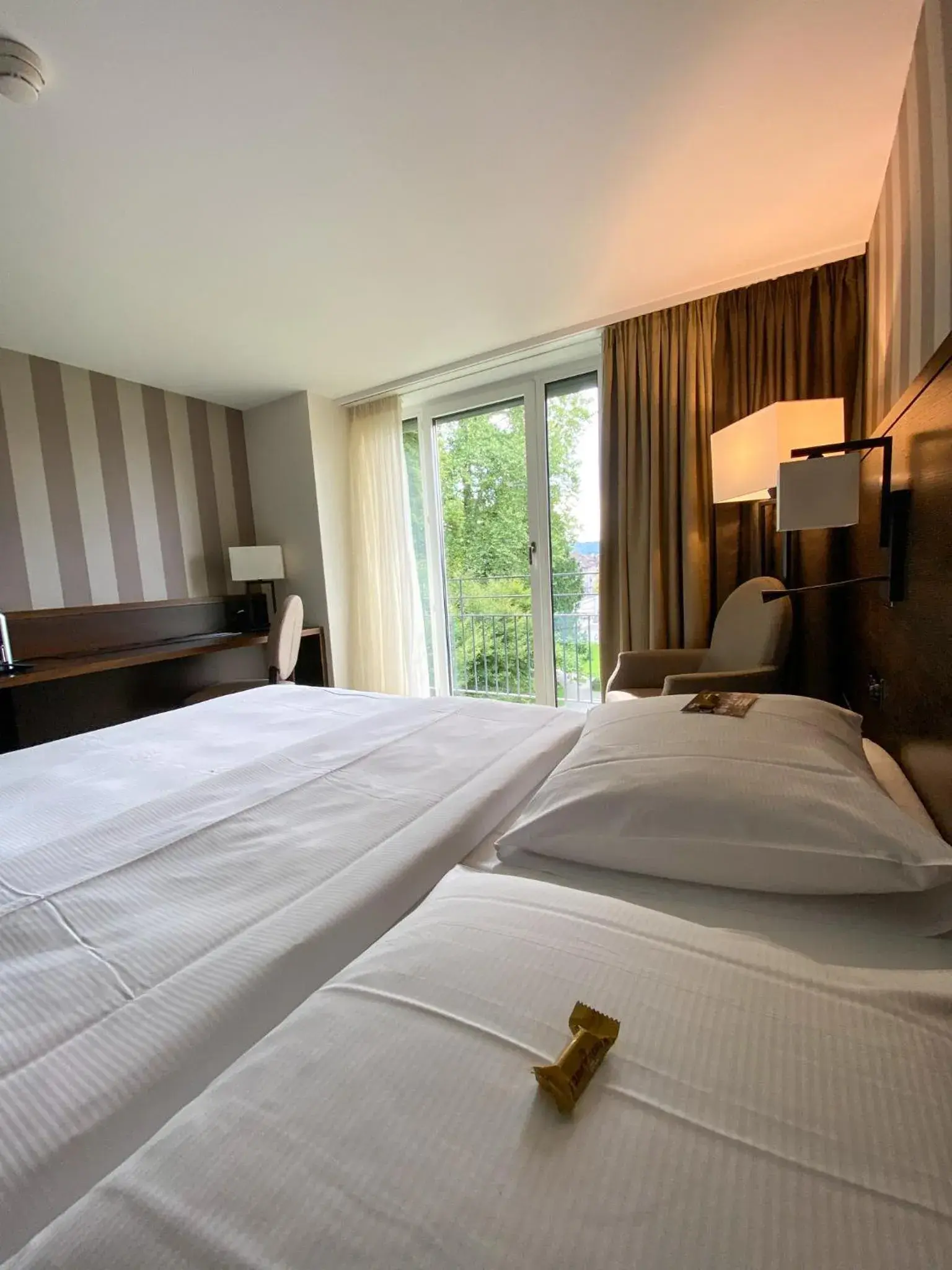 View (from property/room), Bed in Park Hotel Winterthur View (from property/room), Bed in Park Hotel Winterthur