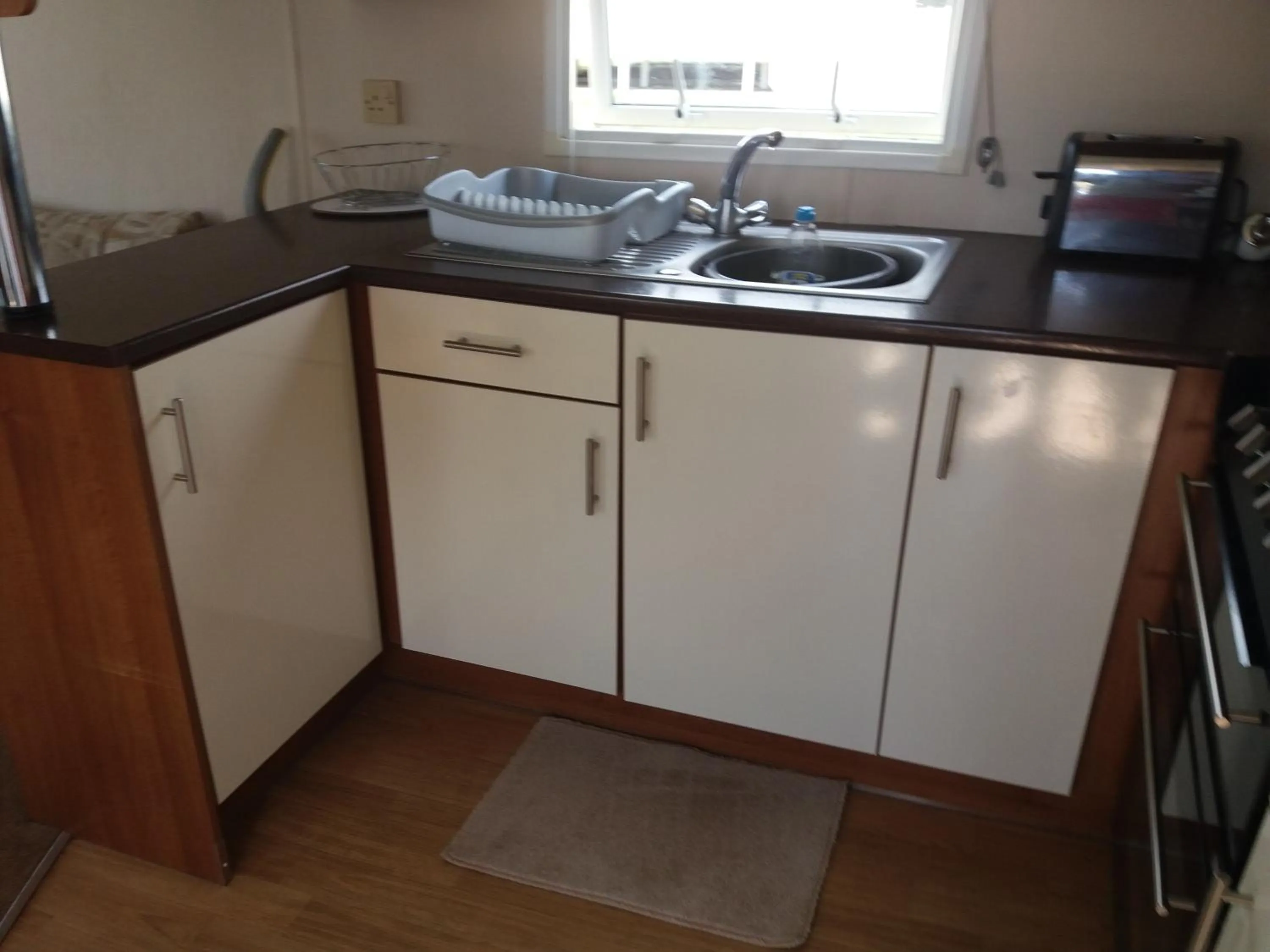 Kitchen or kitchenette in 2013 Willerby Sunset Static Caravan Holiday Home