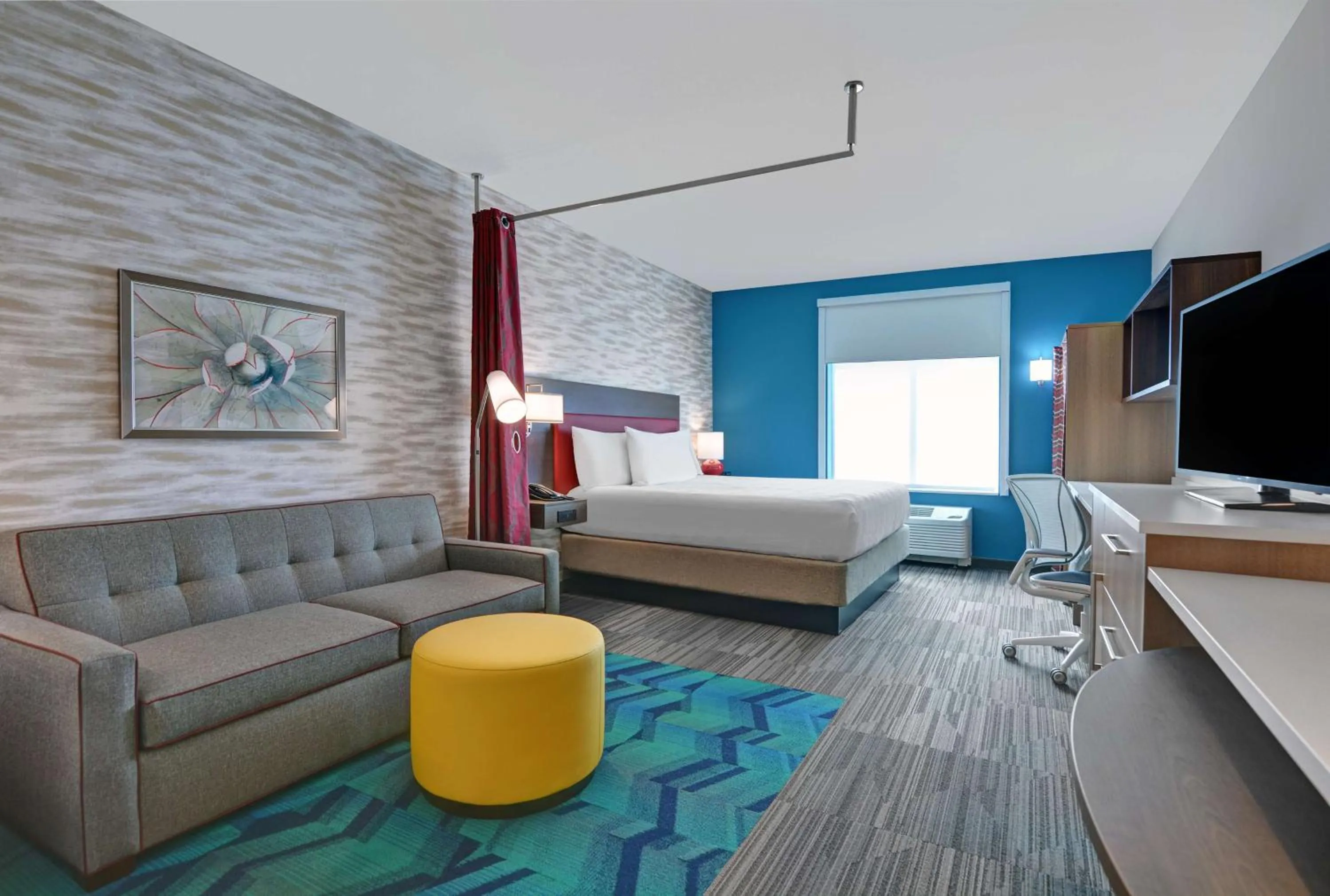 Living room, Bed in Home2 Suites By Hilton Melbourne Viera