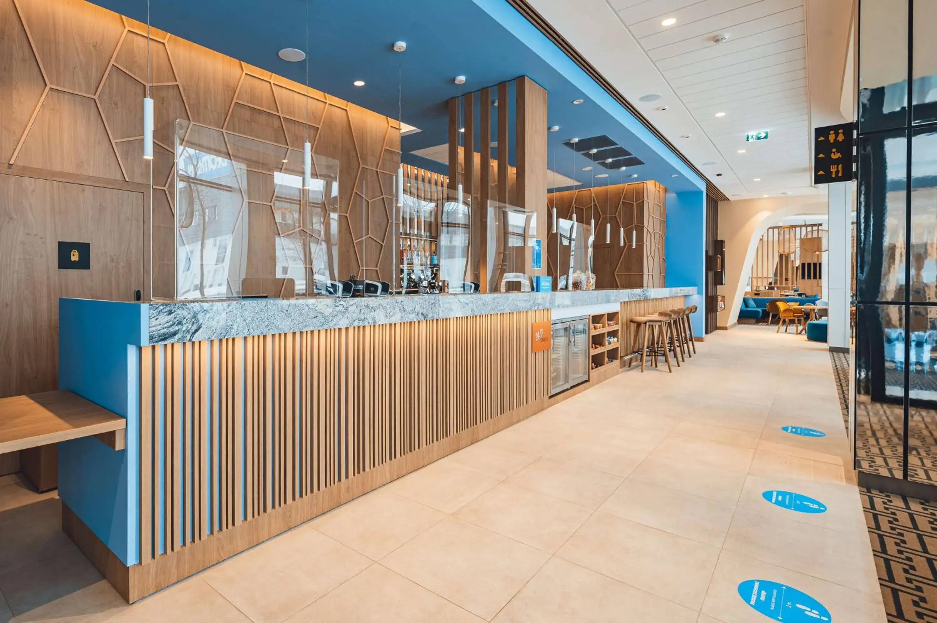Lobby or reception in Hampton By Hilton Warsaw Reduta Lobby or reception in Hampton By Hilton Warsaw Reduta