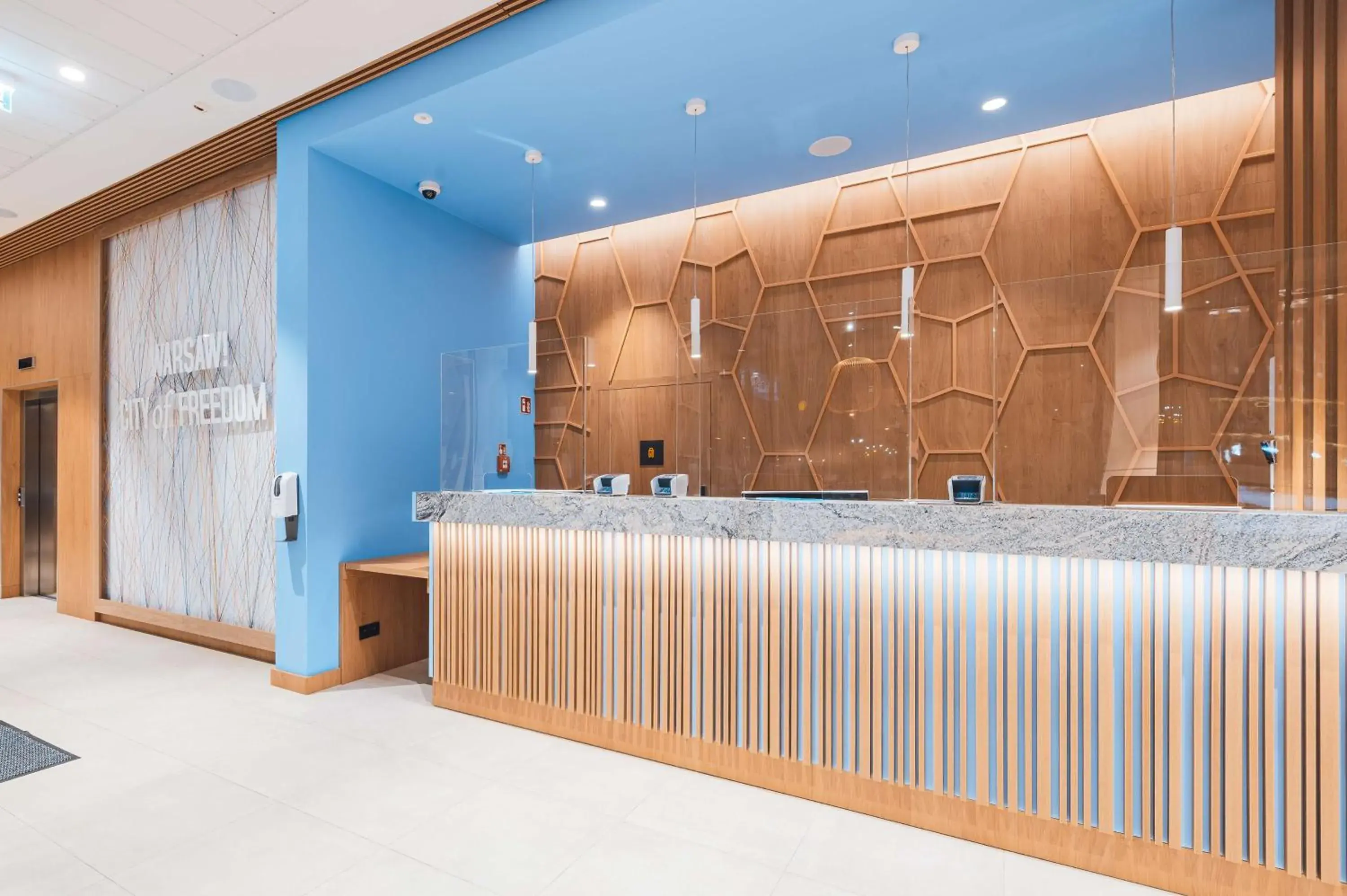 Lobby or reception in Hampton By Hilton Warsaw Reduta Lobby or reception in Hampton By Hilton Warsaw Reduta