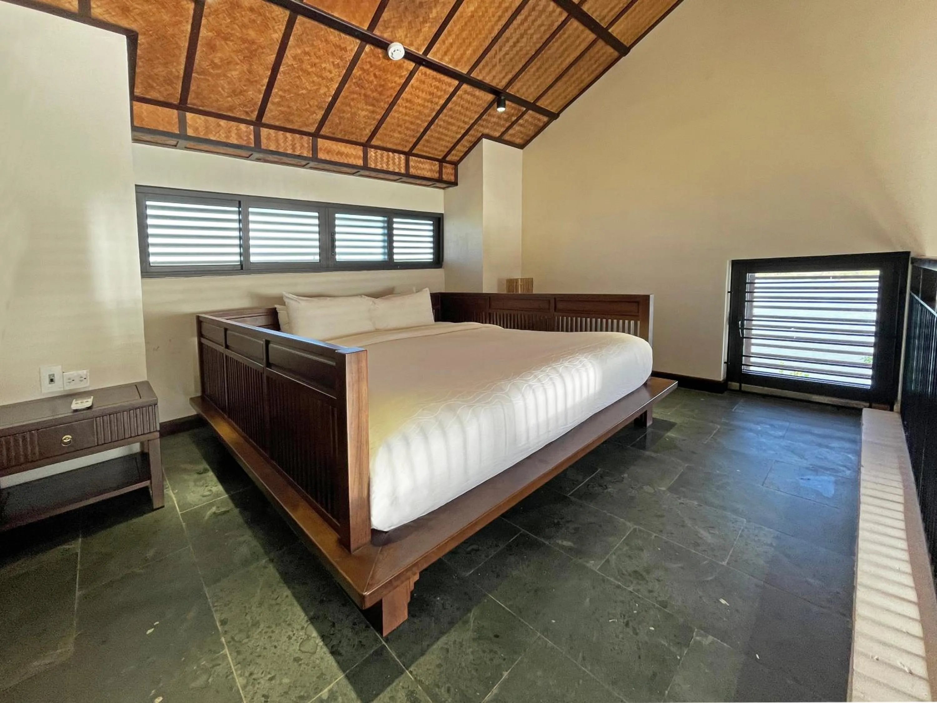 Bed in Nghê Prana Hotel and Spa Hoi An