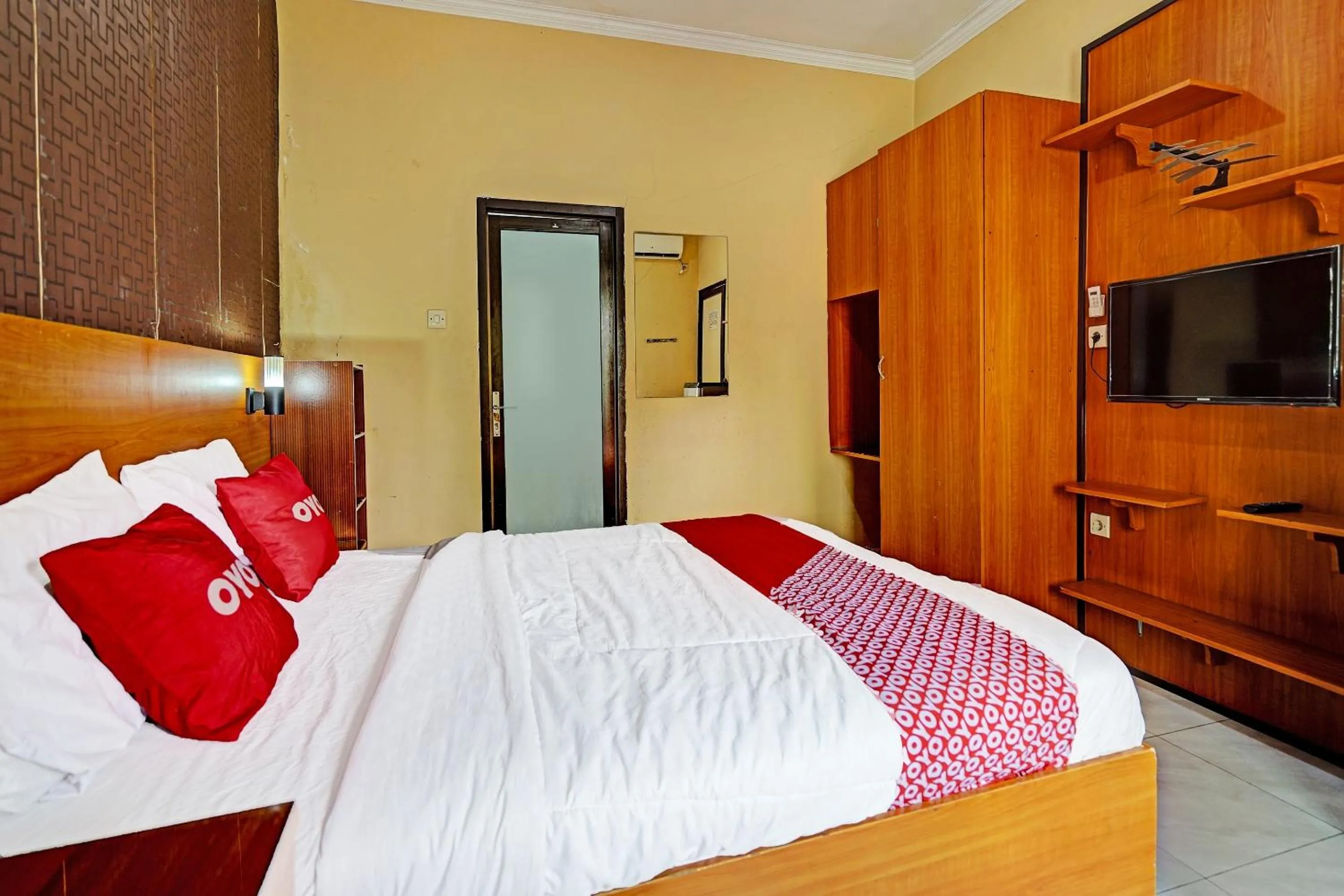 Bedroom in OYO 91547 Graha Hermawan Guest House Syariah