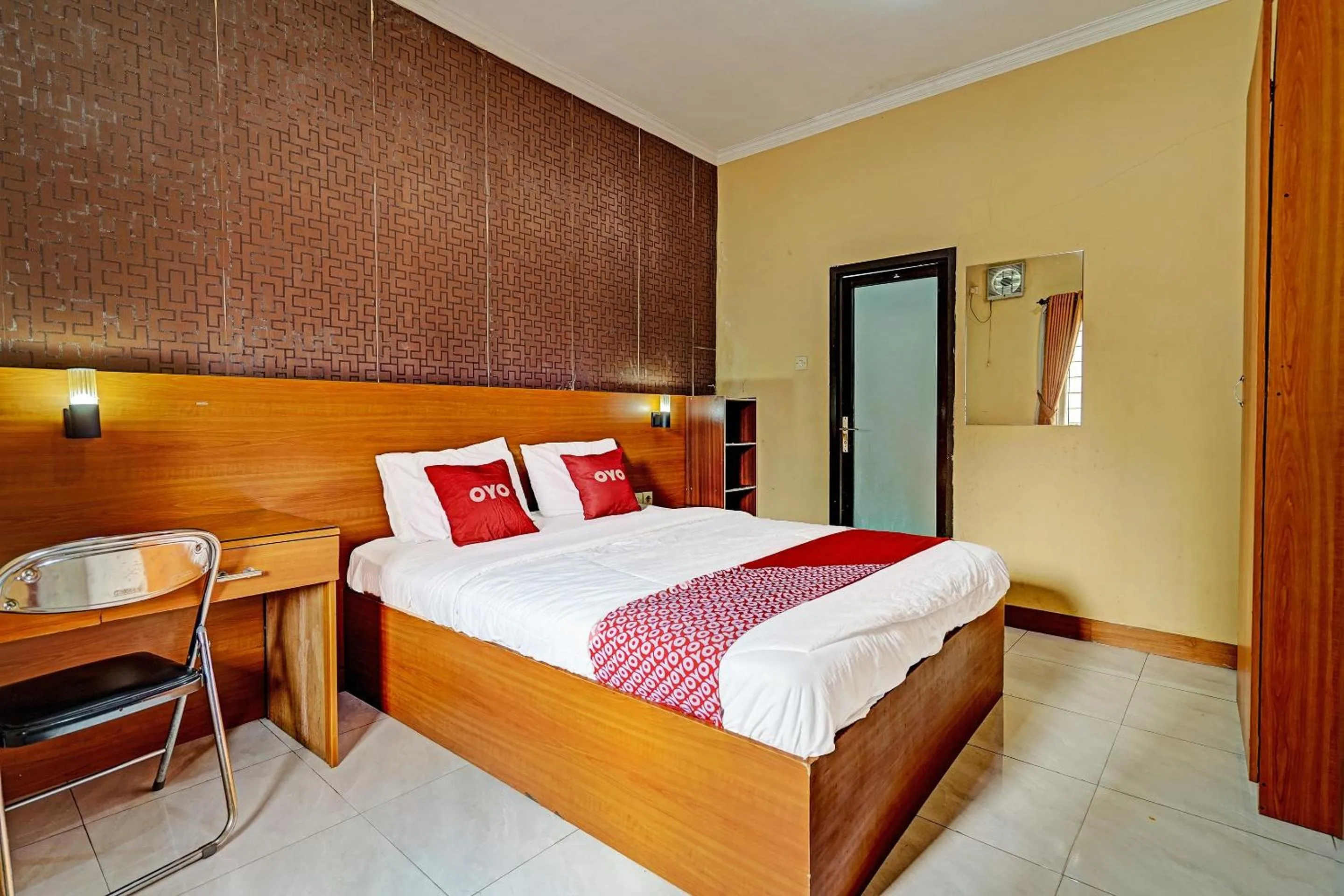 Bedroom in OYO 91547 Graha Hermawan Guest House Syariah
