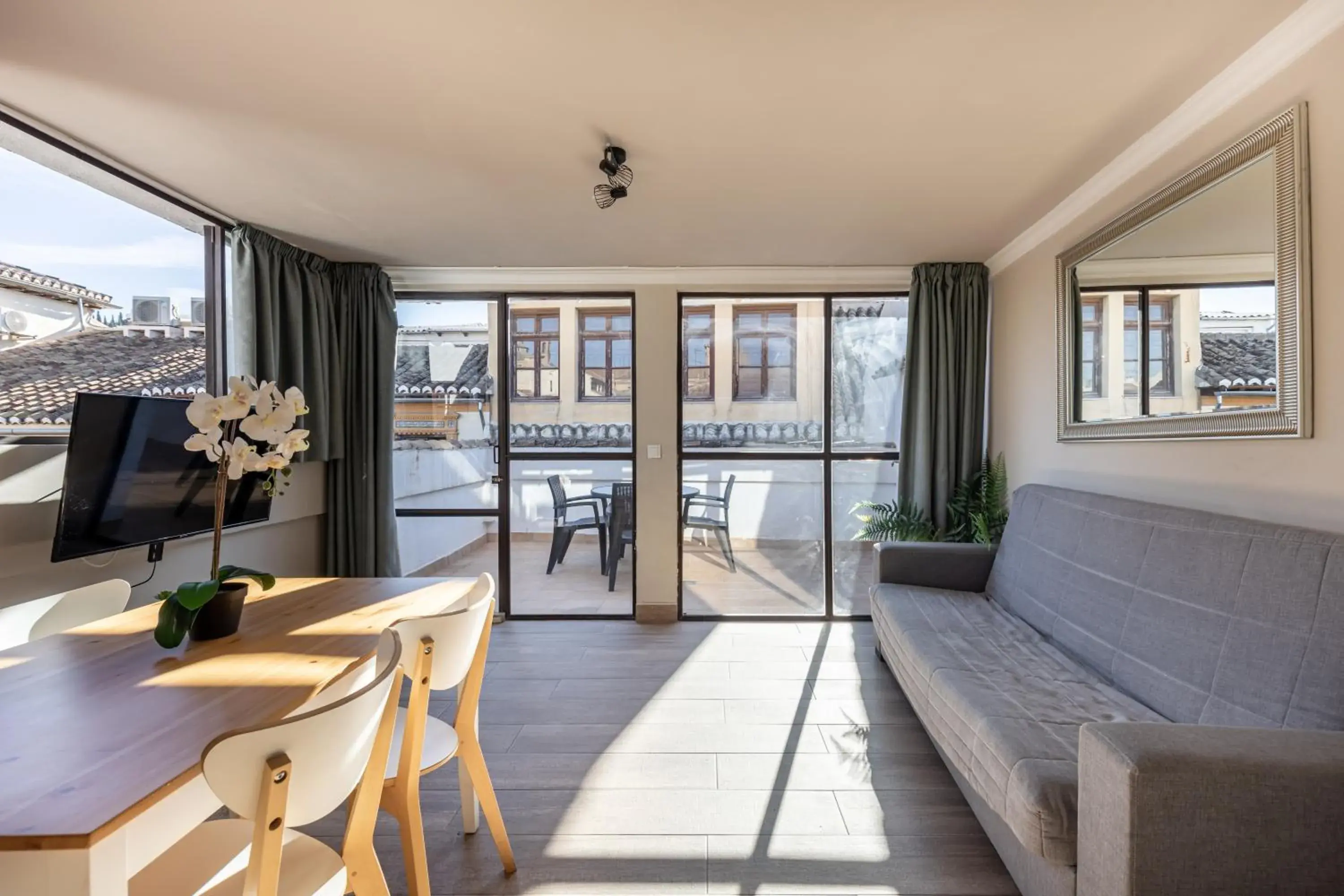 Living room in Apartamentos Alhambra Granada 3000 Living room in Apartamentos Alhambra Granada 3000