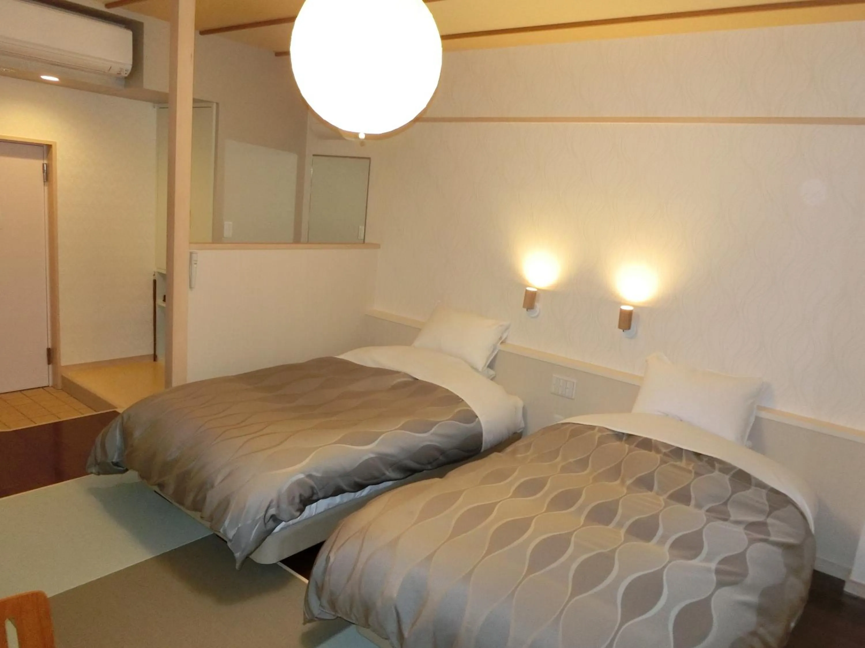 Bed in Kusatsu Skyland Hotel