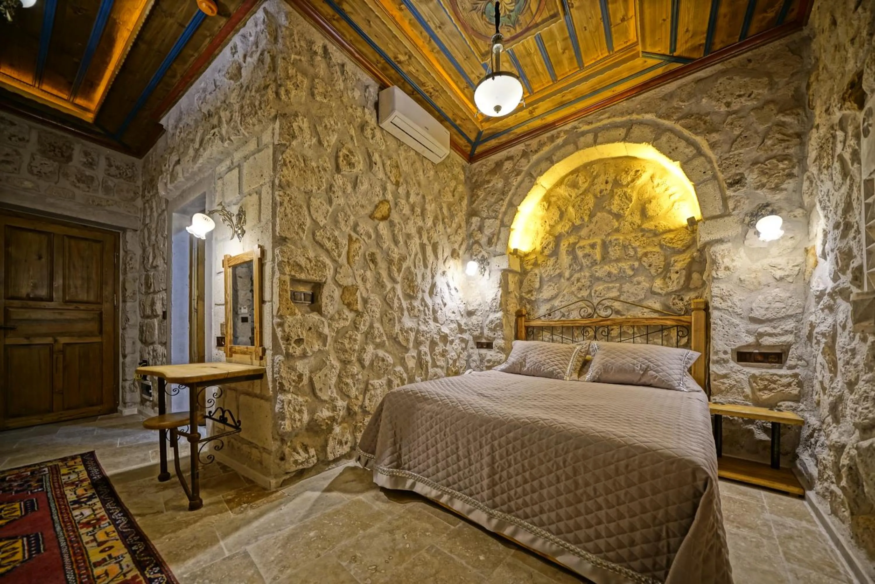 Bed in Cappadocia Cave Lodge