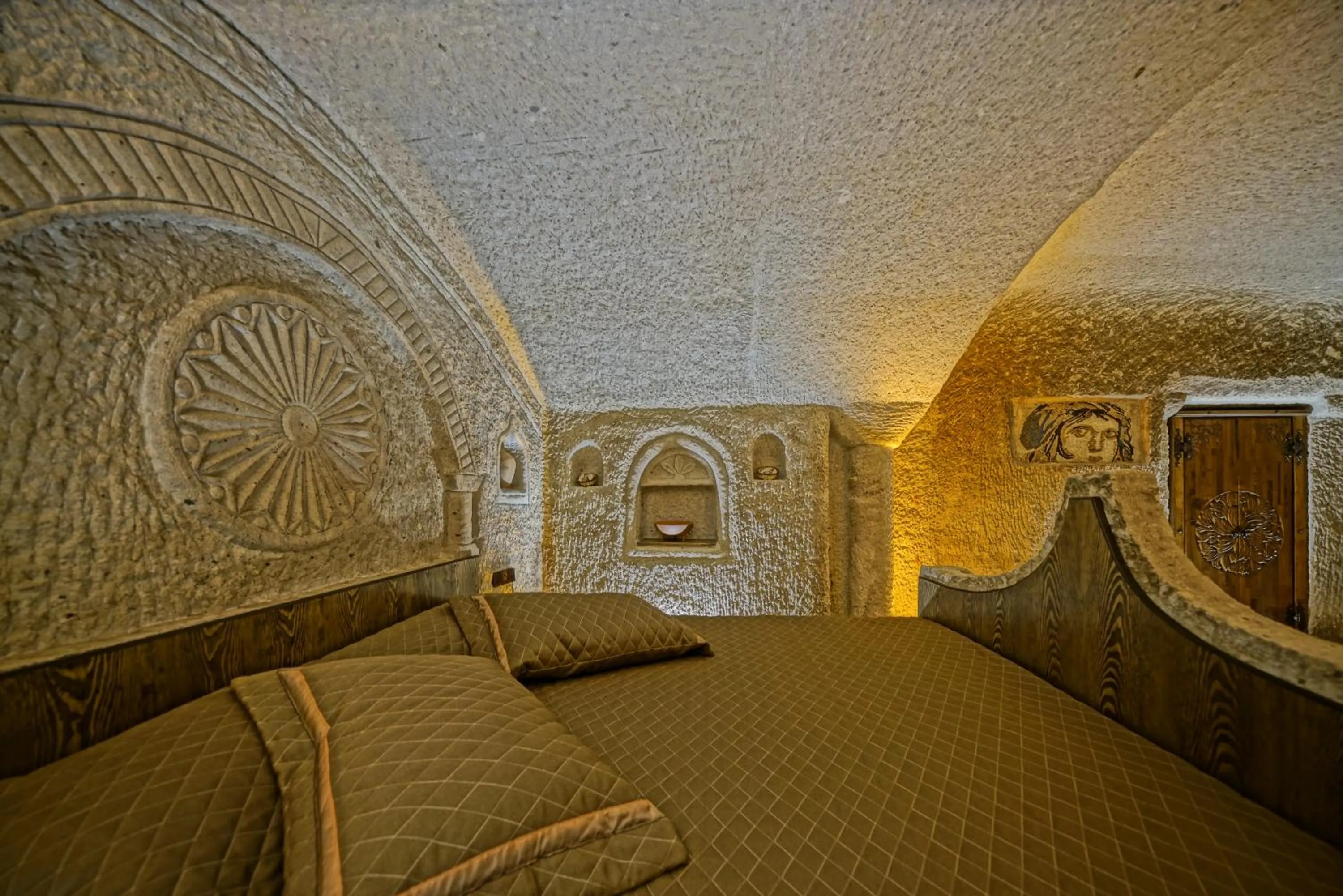 Bed in Cappadocia Cave Lodge