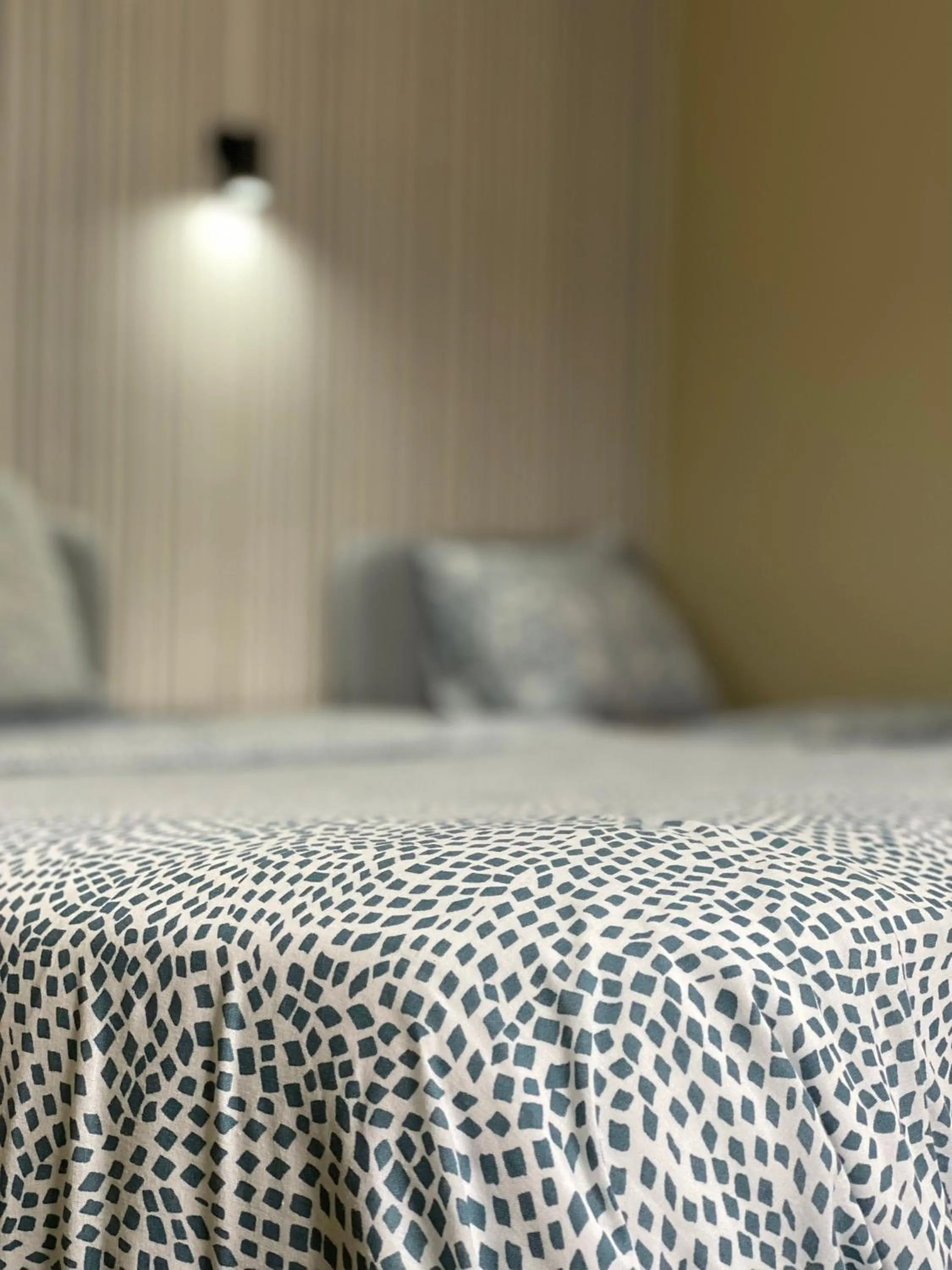 Bed in Sri-Indo Guest House