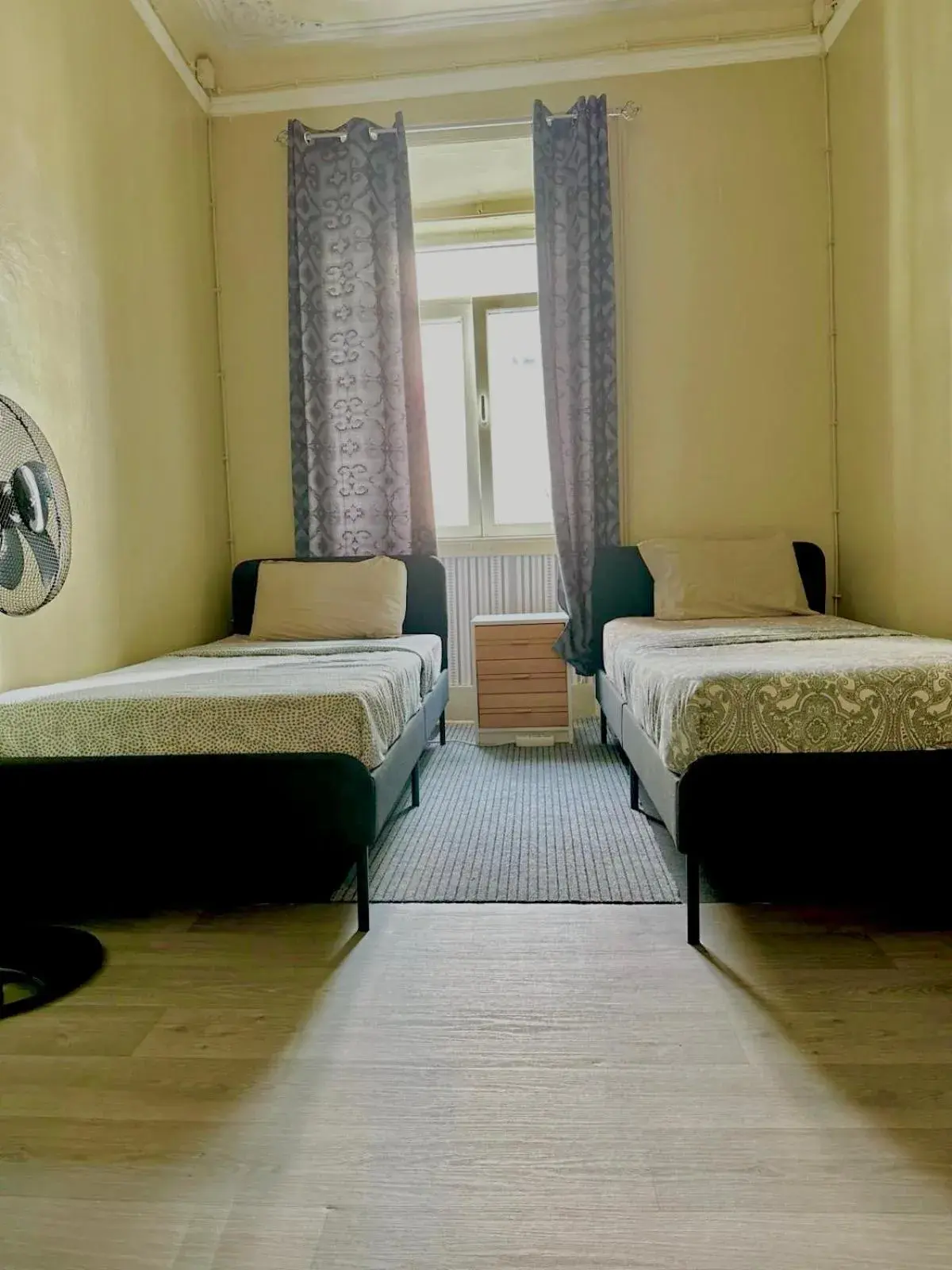 Standard Twin Room with Shared Bathroom in Sri-Indo Guest House Standard Twin Room with Shared Bathroom in Sri-Indo Guest House