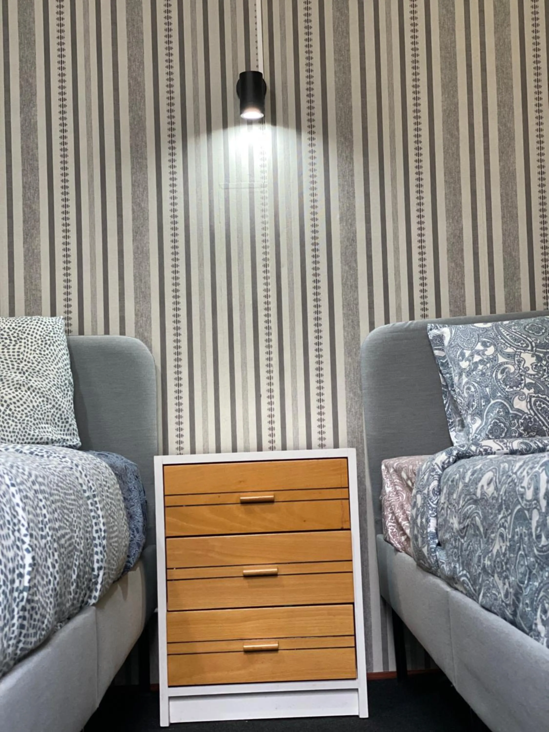 Bed in Sri-Indo Guest House