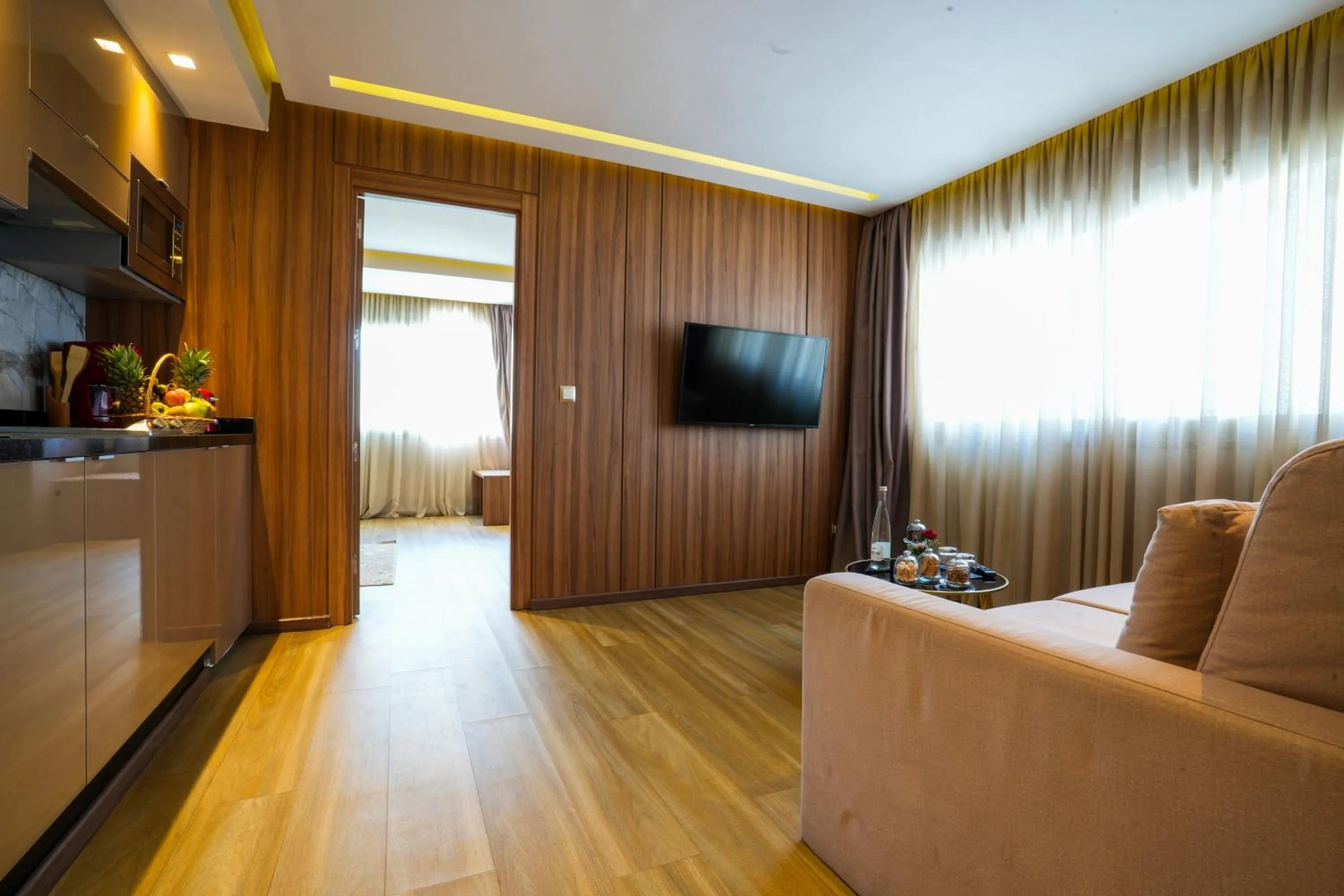 Living room in First Suites Hôtel