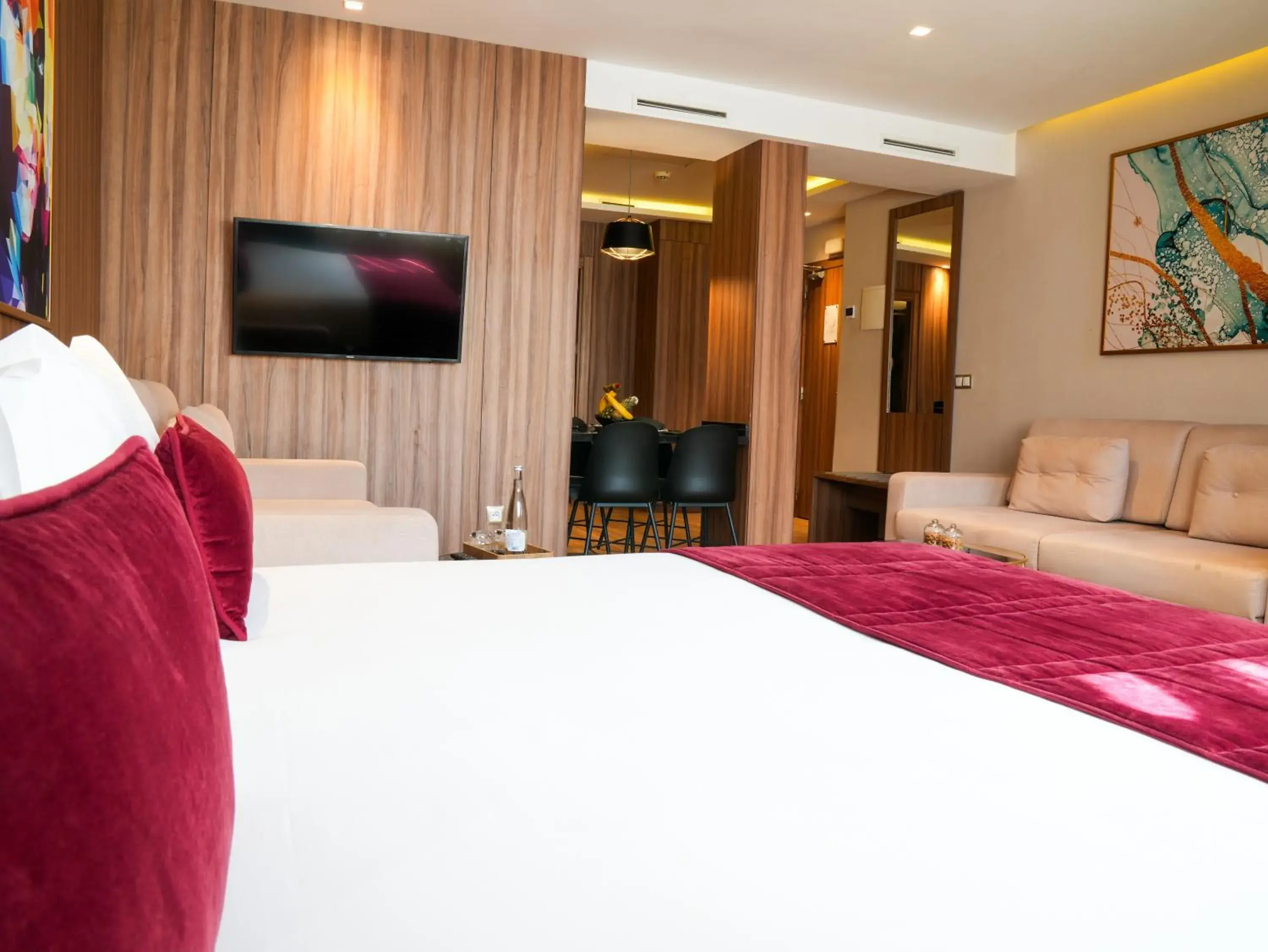 TV and multimedia, Bed in First Suites Hôtel TV and multimedia, Bed in First Suites Hôtel