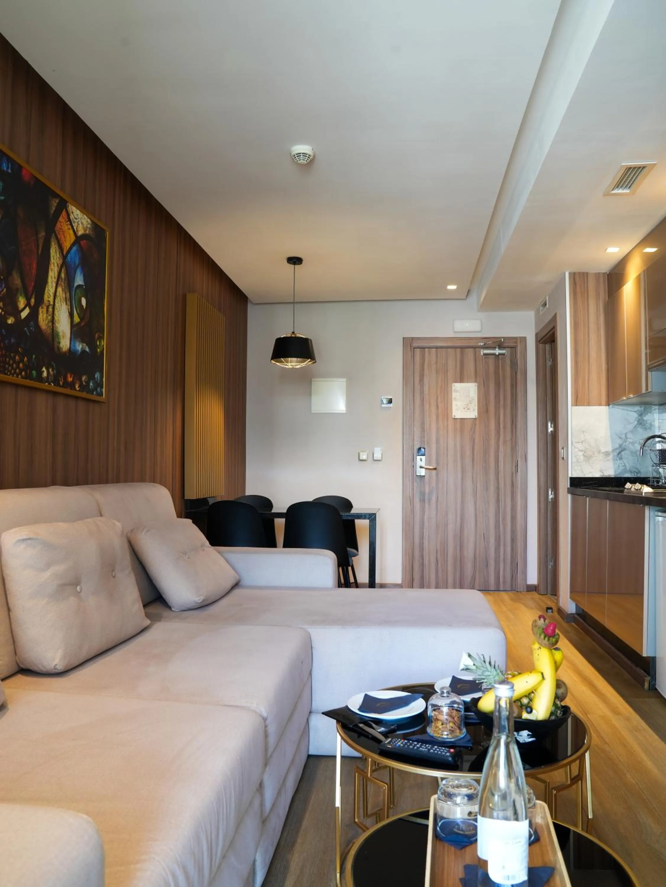 Living room in First Suites Hôtel