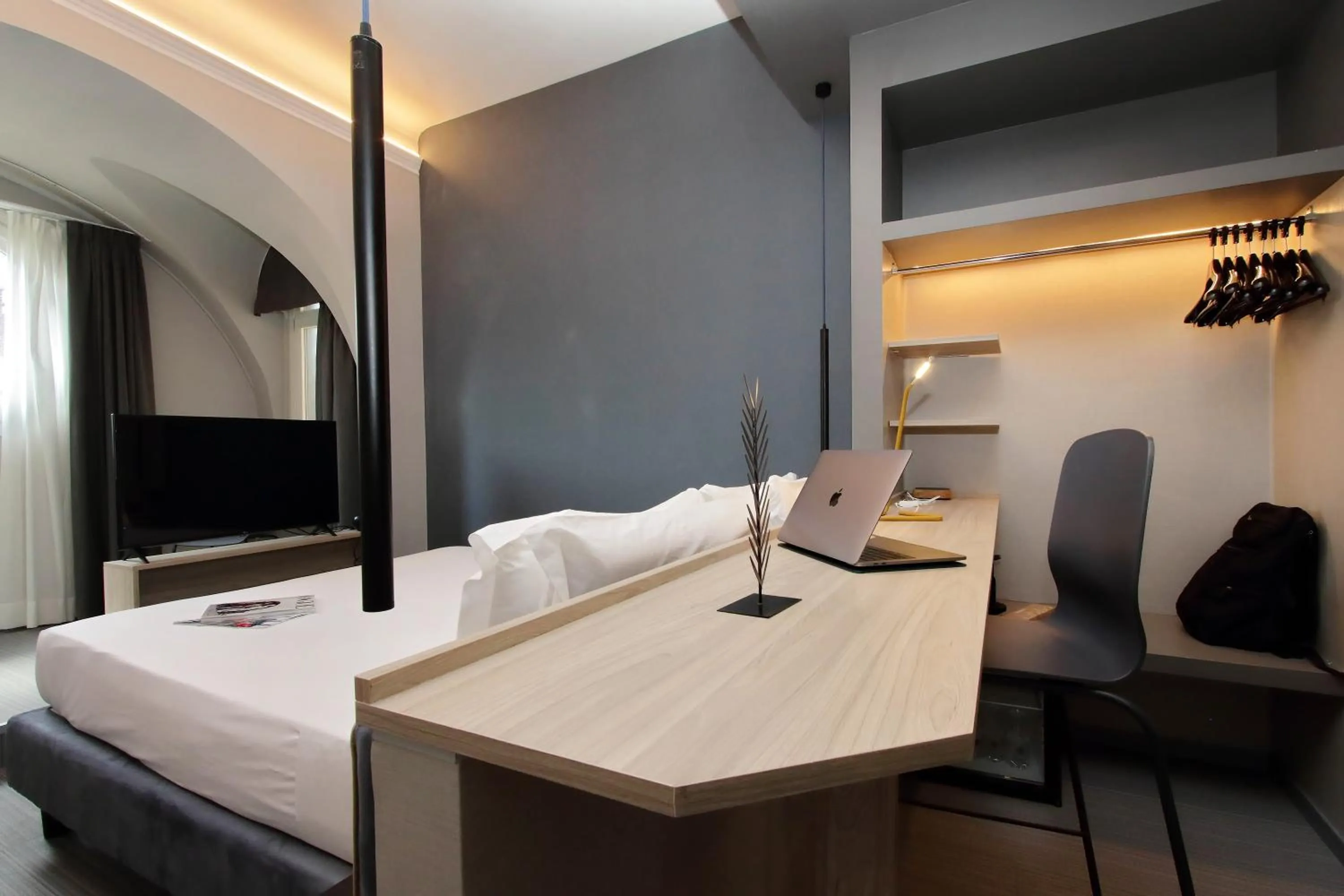 Photo of the whole room, Bed in Vico Fashion District