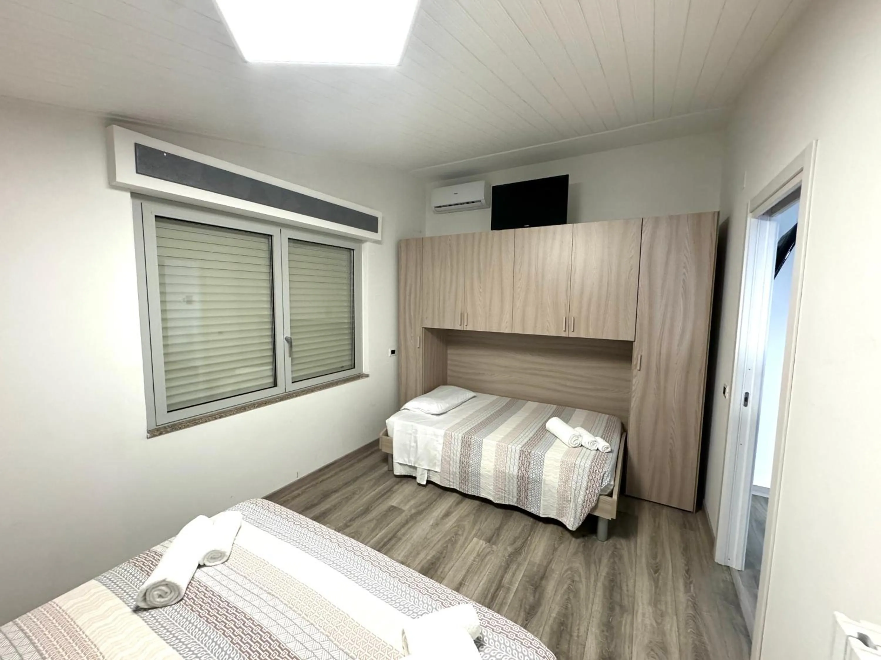 Bed in Siclari B&B-Rooms&Suite