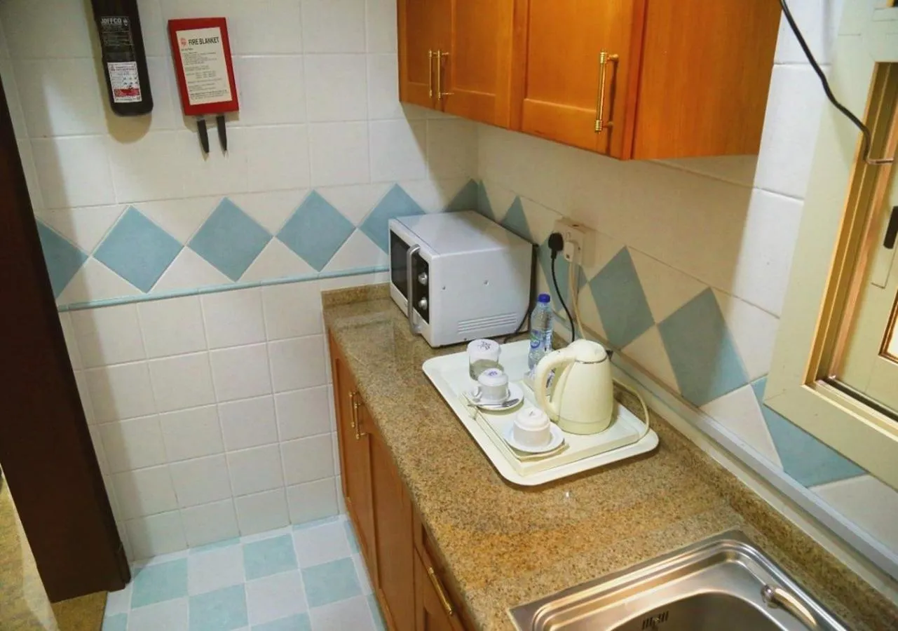 kitchen in Safeer Hotel Suites