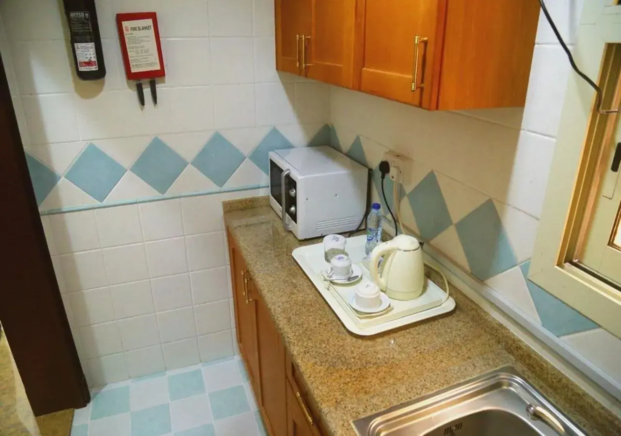 kitchen in Safeer Hotel Suites kitchen in Safeer Hotel Suites