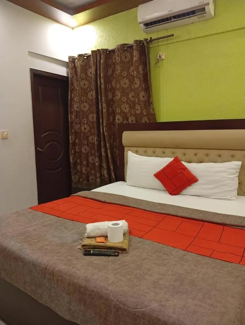 Bed in GOHO Rooms Badar