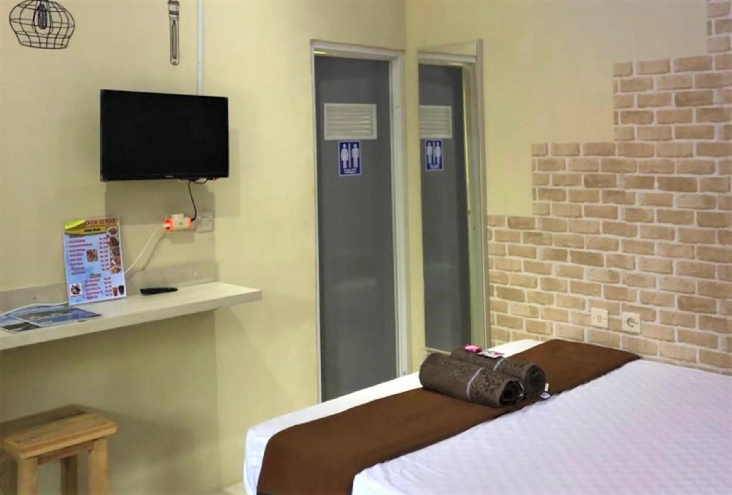 TV and multimedia, Bed in Penginapan Rudi Syariah