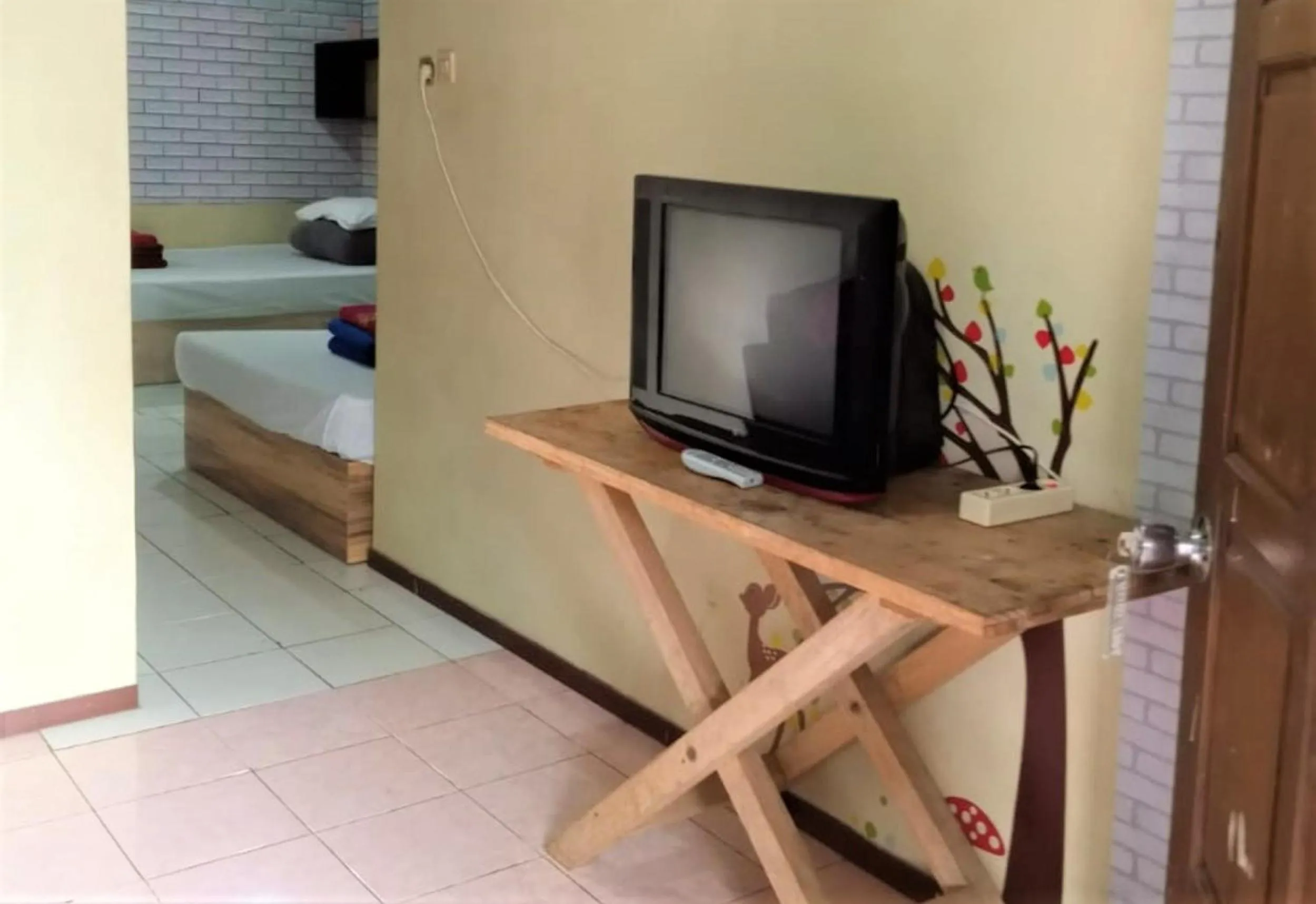 TV and multimedia, Bed in Penginapan Rudi Syariah