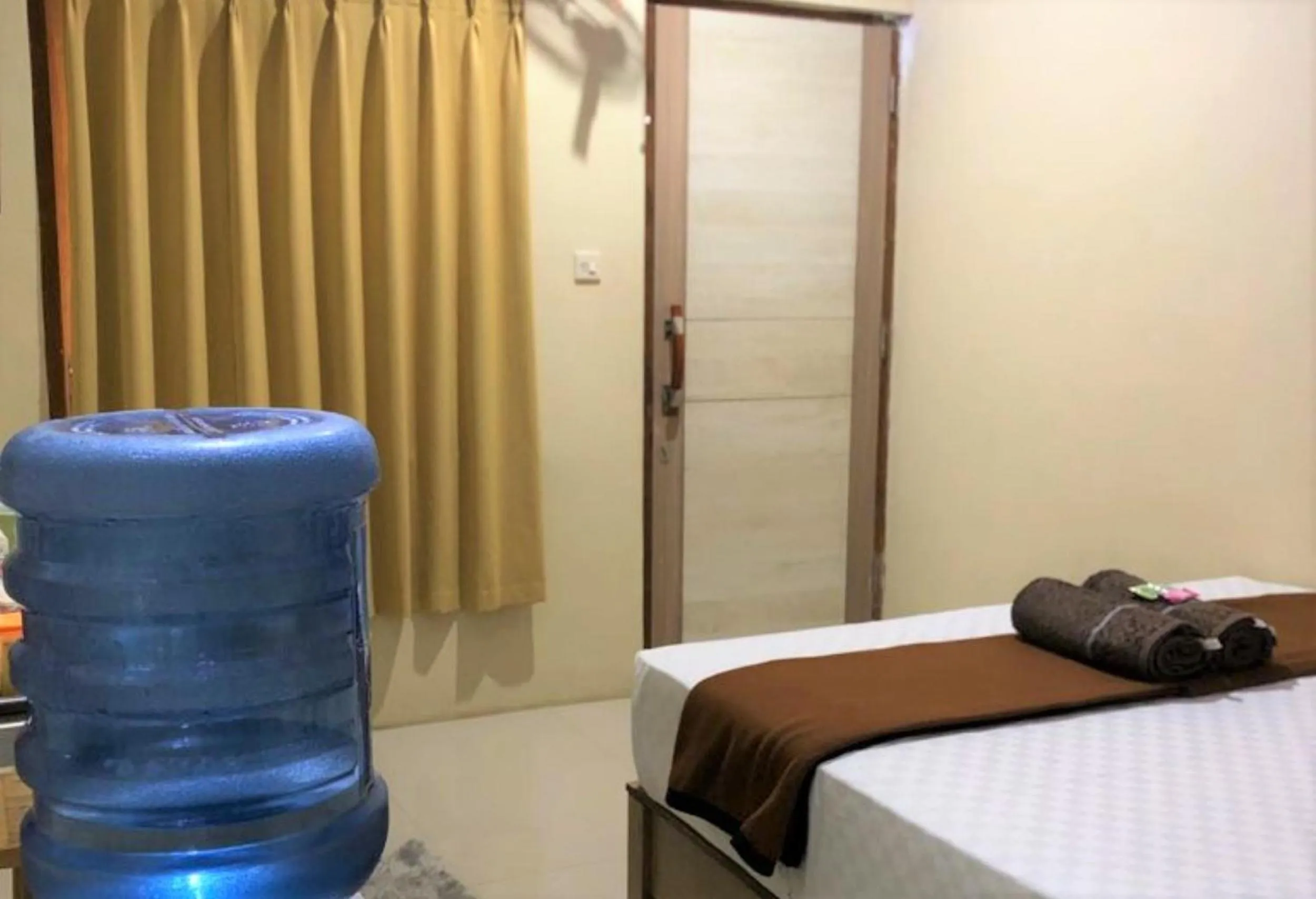 Bed in Penginapan Rudi Syariah