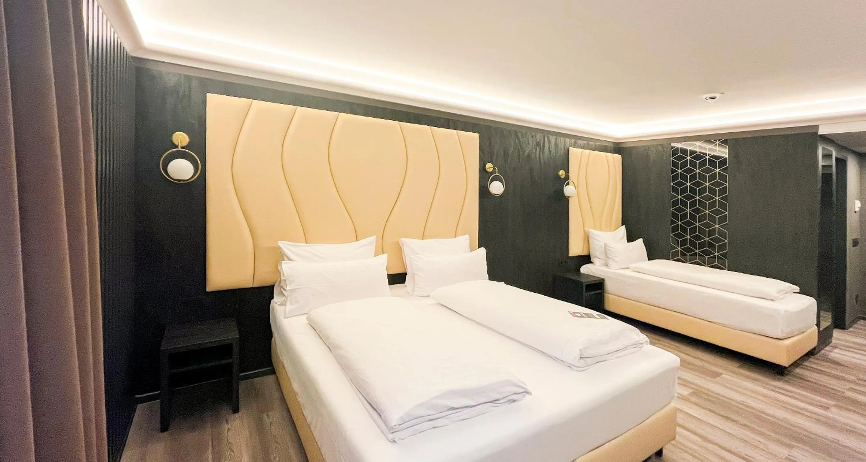 Photo of the whole room, Bed in PLAZA Premium Parkhotel Neu-Ulm