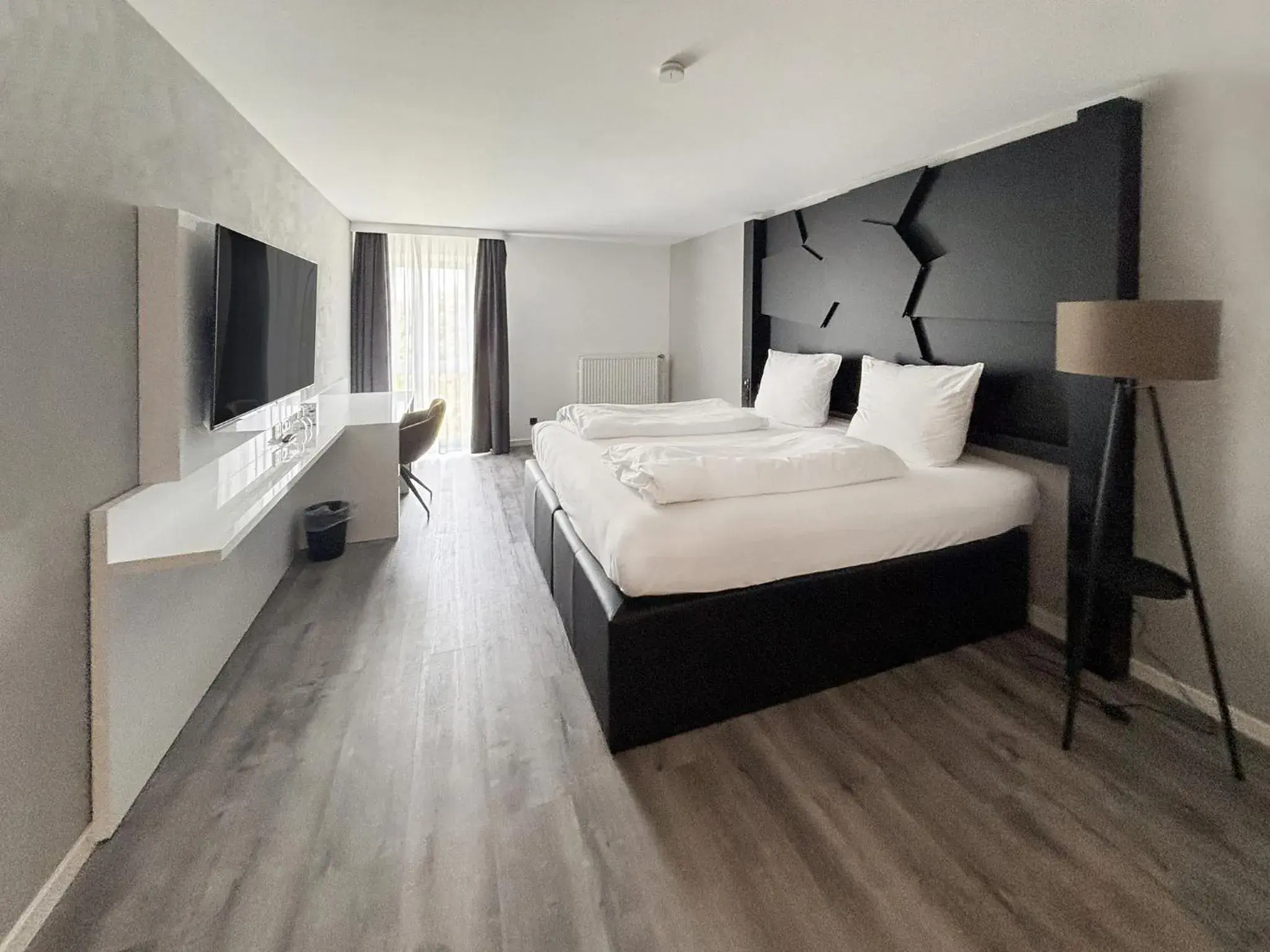 Photo of the whole room, Bed in DORMERO Hotel Weingarten Photo of the whole room, Bed in DORMERO Hotel Weingarten