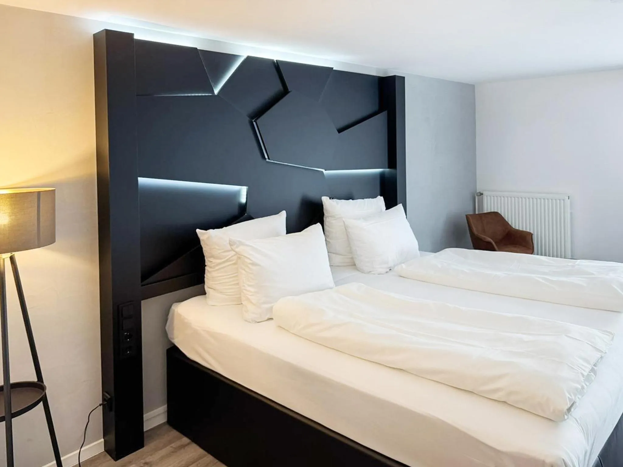 Photo of the whole room, Bed in DORMERO Hotel Weingarten