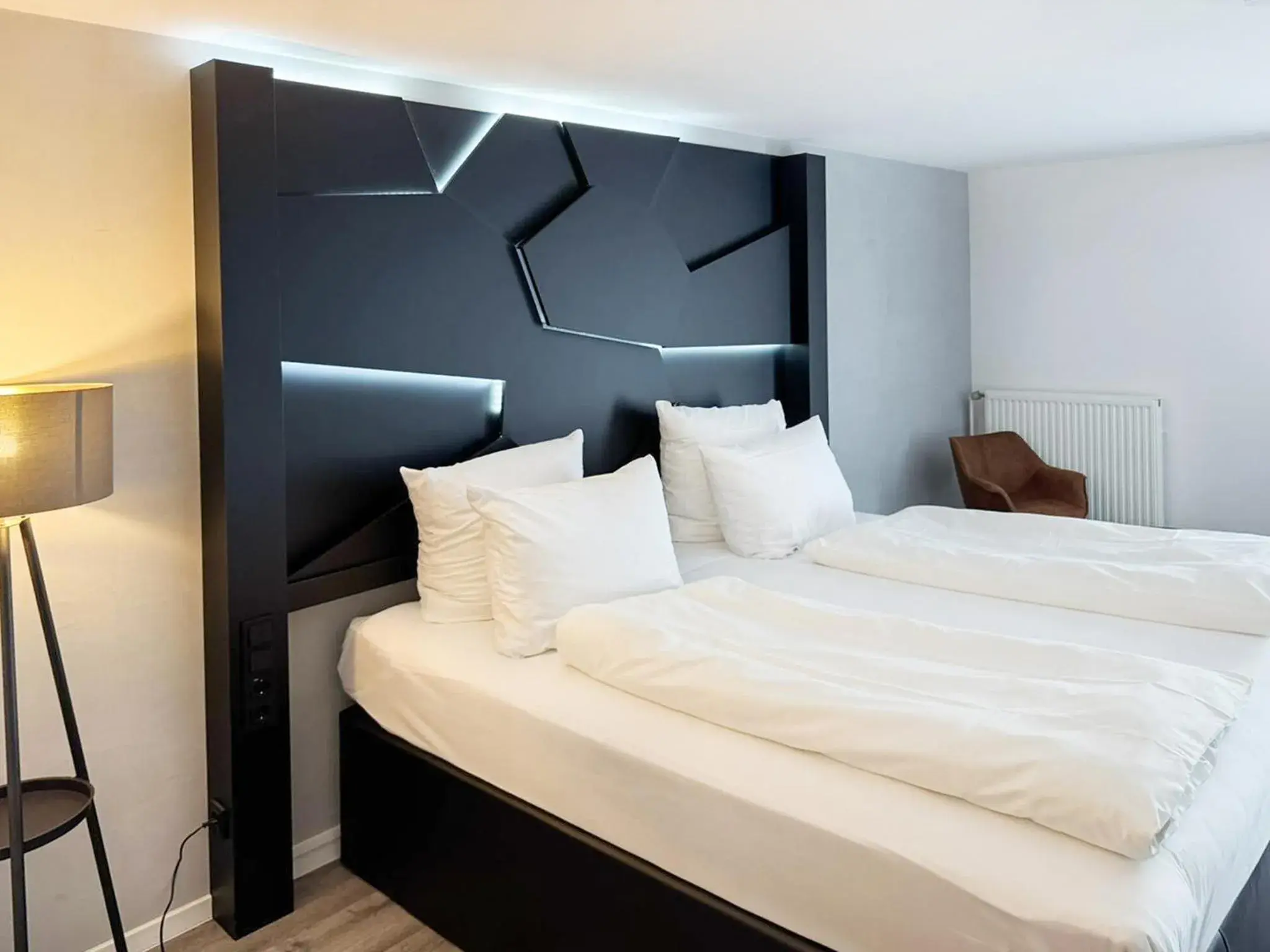 Photo of the whole room, Bed in DORMERO Hotel Weingarten Photo of the whole room, Bed in DORMERO Hotel Weingarten