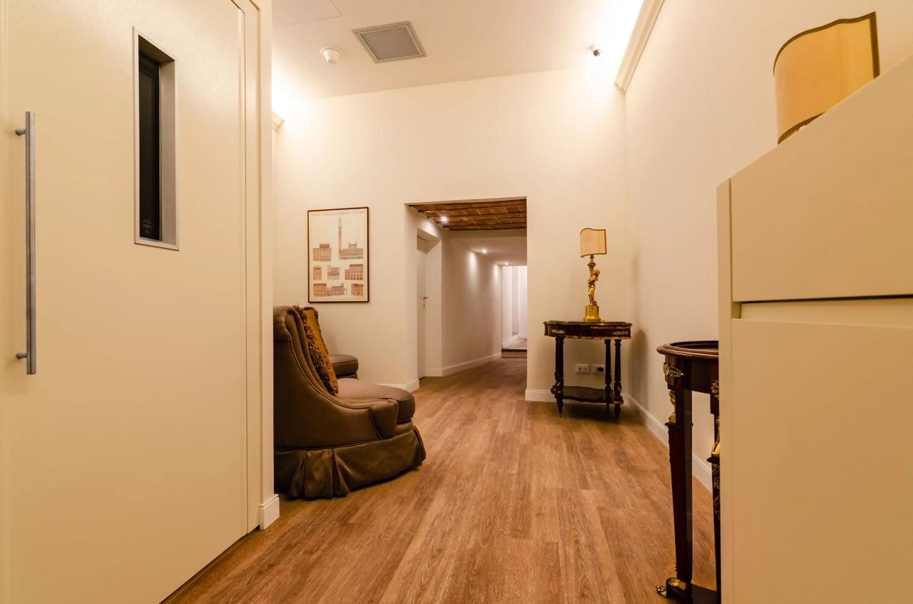 Communal lounge/ TV room in Il giardino di Pantaneto Residenza D'Epoca