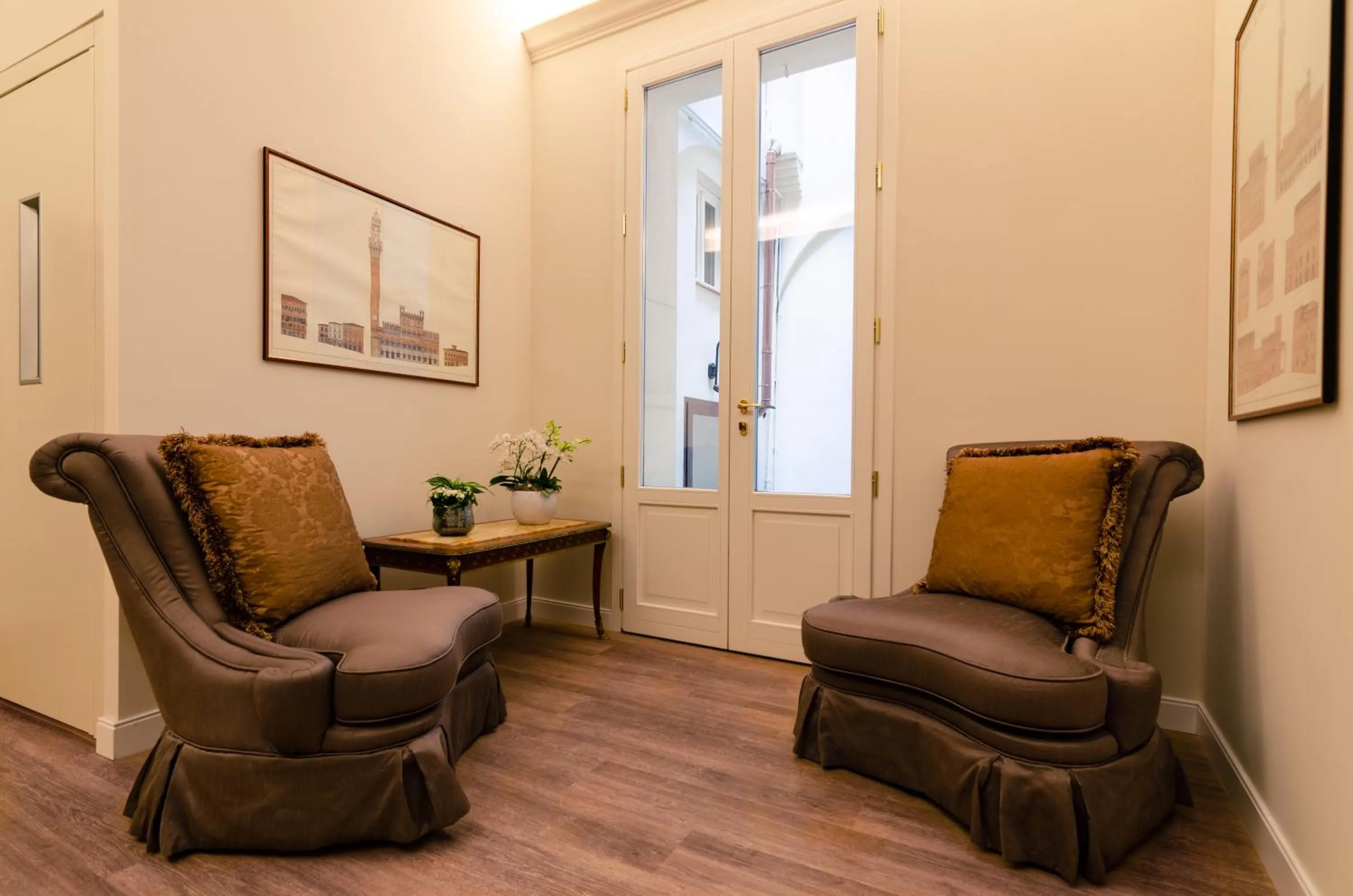 Communal lounge/ TV room in Il giardino di Pantaneto Residenza D'Epoca