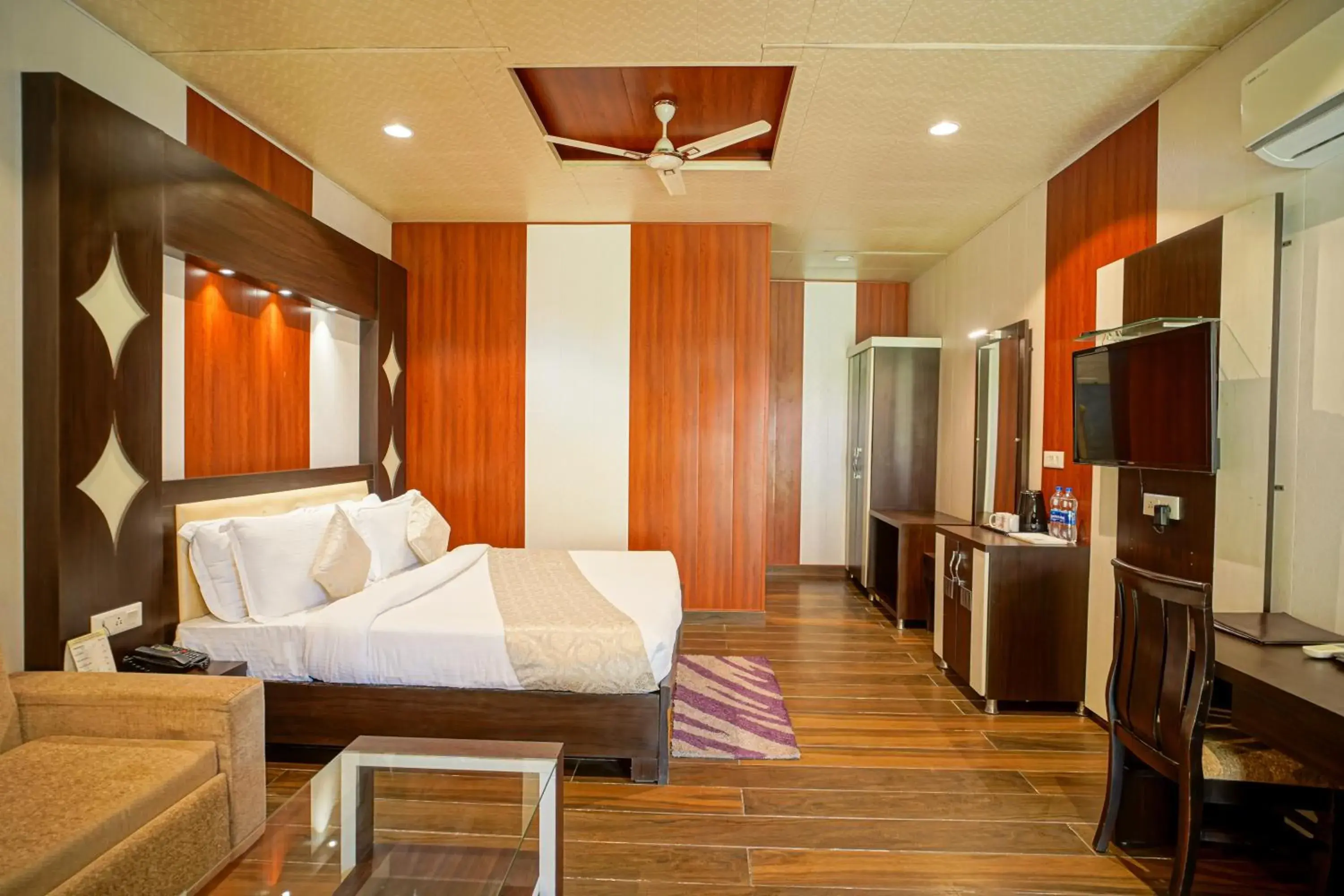 Bed in The Grand Shiva Resort and Spa Bed in The Grand Shiva Resort and Spa