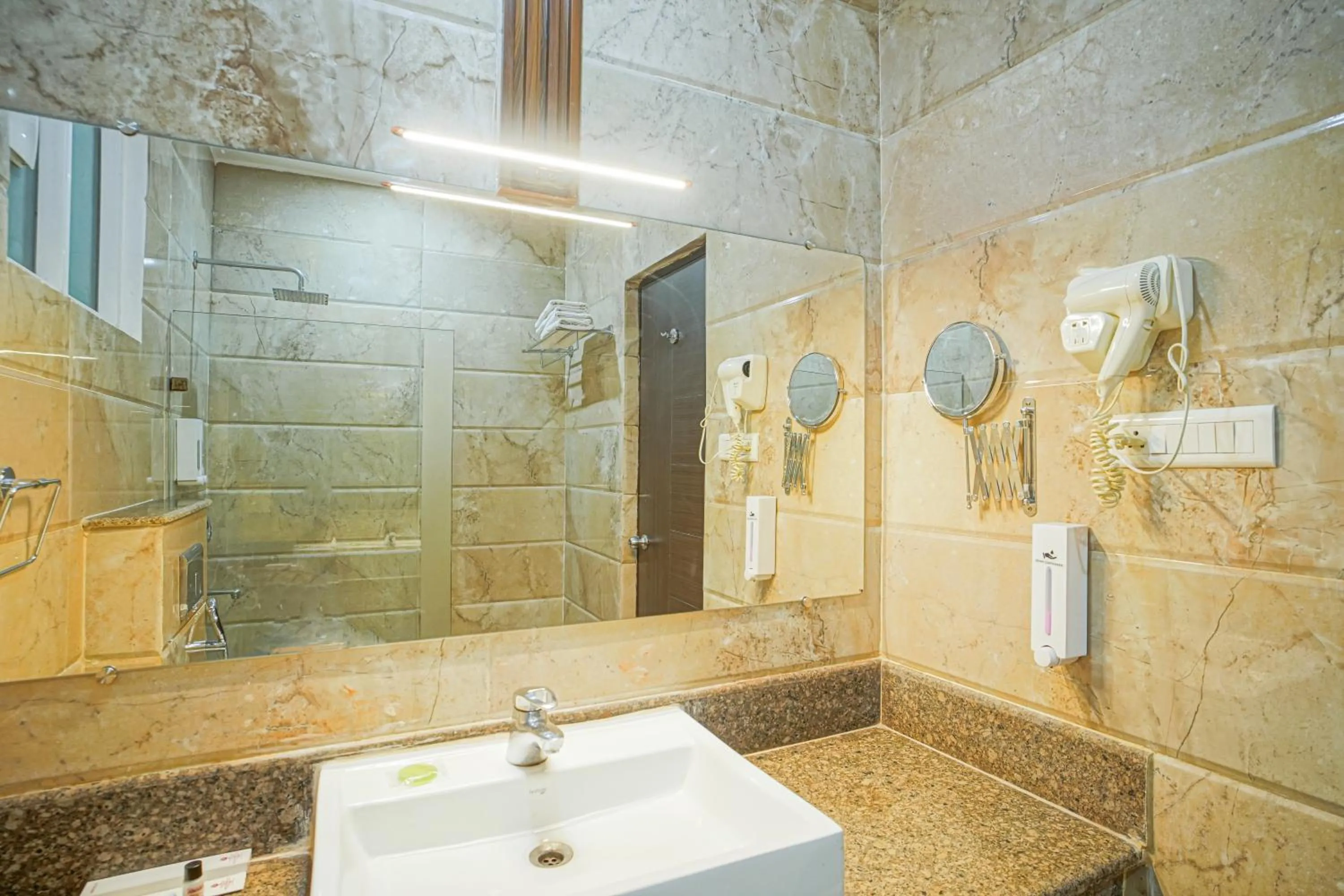 Shower in The Grand Shiva Resort and Spa