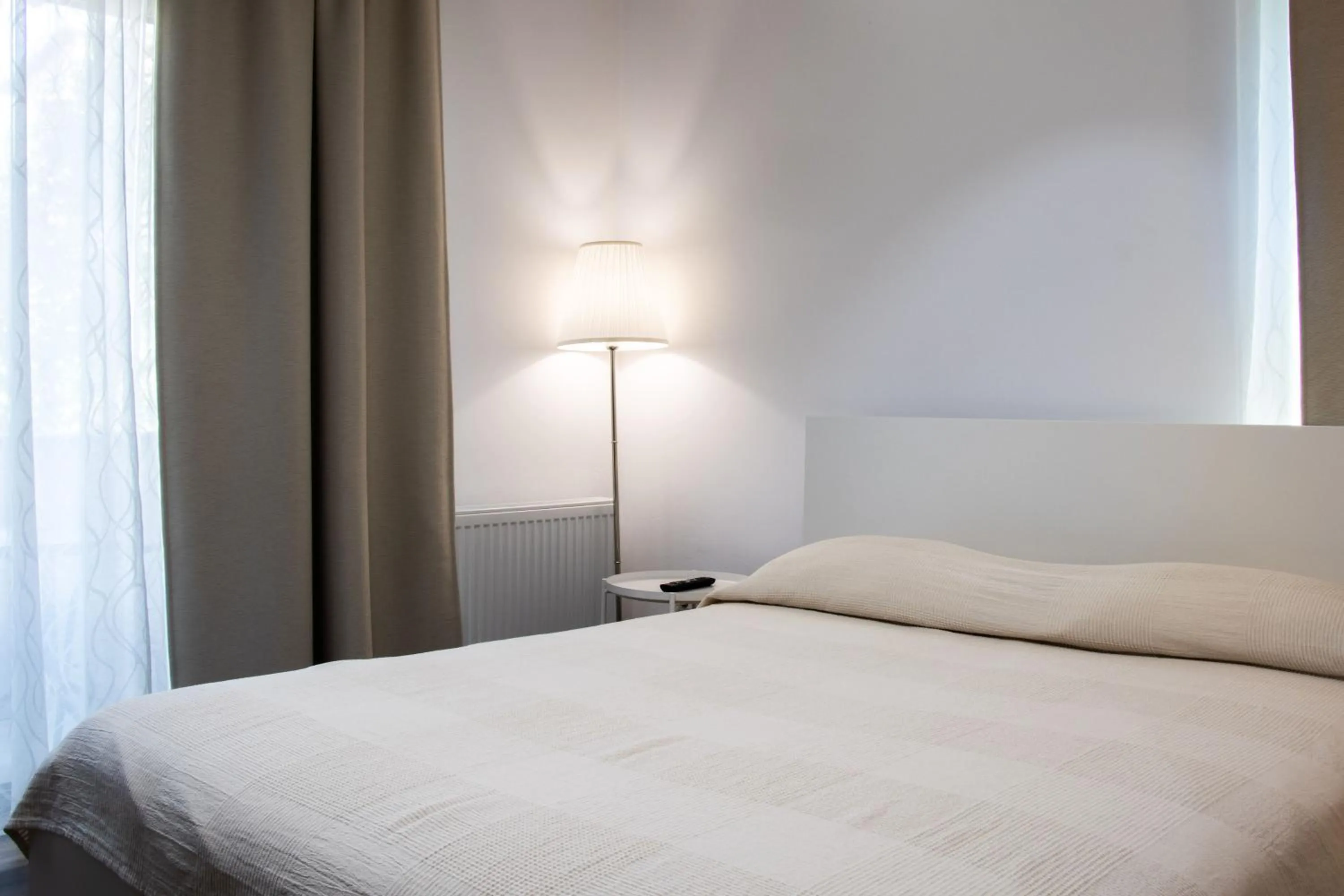 Bed in Clement Apartments